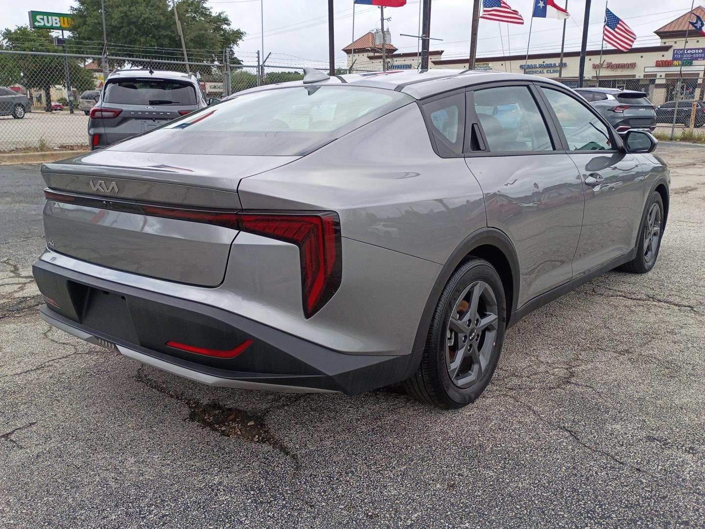 2025 Gray /Black Kia K4 LX (3KPFT4DE6SE) with an 2.0L L4 DOHC 16V engine, CVT transmission, located at 1842 Wirt Road, Houston, TX, 77055, (713) 973-3903, 29.805330, -95.484787 - Photo#4