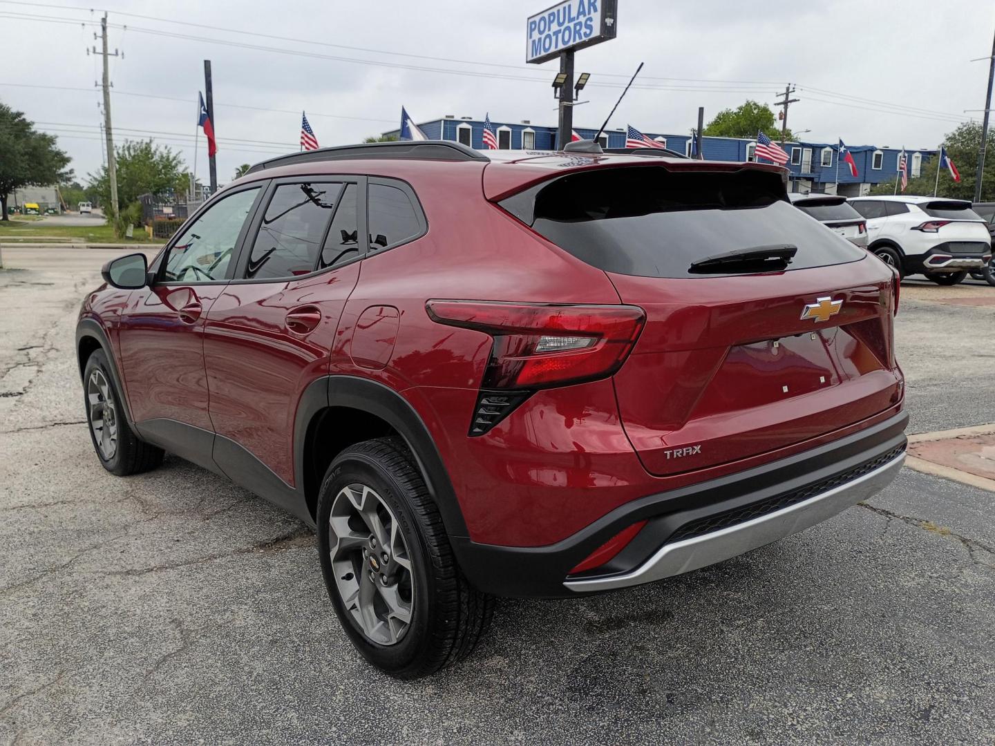 2025 MAROON /Black Chevrolet Trax LT (KL77LHEP7SC) with an 1.2L L3 TURBO engine, 6A transmission, located at 1842 Wirt Road, Houston, TX, 77055, (713) 973-3903, 29.805330, -95.484787 - Photo#2