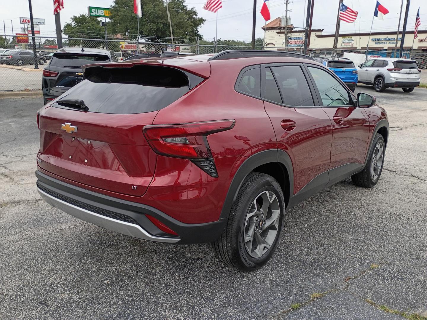 2025 MAROON /Black Chevrolet Trax LT (KL77LHEP7SC) with an 1.2L L3 TURBO engine, 6A transmission, located at 1842 Wirt Road, Houston, TX, 77055, (713) 973-3903, 29.805330, -95.484787 - Photo#4