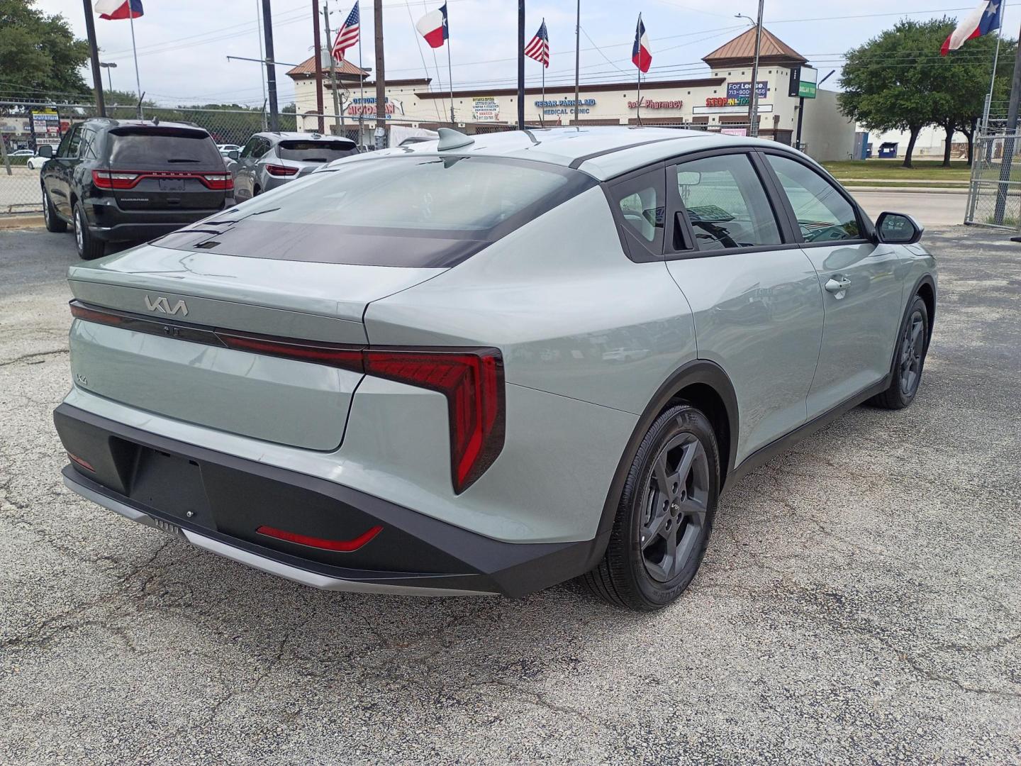 2026 Gray Kia K4 LX (3KPFT4DE8TE) with an 2.0L L4 DOHC 16V engine, CVT transmission, located at 1842 Wirt Road, Houston, TX, 77055, (713) 973-3903, 29.805330, -95.484787 - Photo#4