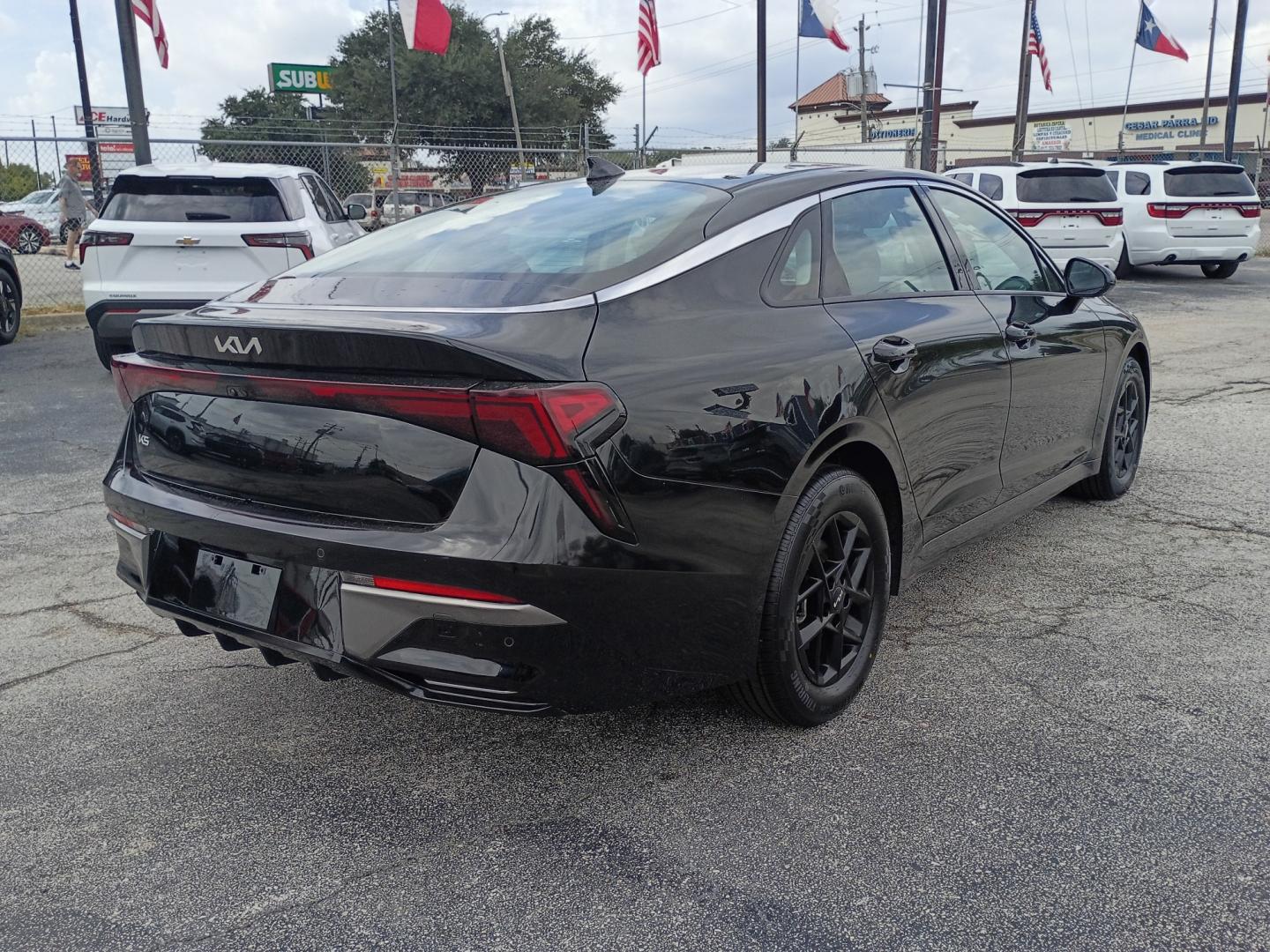 2026 Black /Black KIA K5 LXS (KNAG24J79T5) with an 2.5L L4 DOHC 16V engine, 8A transmission, located at 1842 Wirt Road, Houston, TX, 77055, (713) 973-3903, 29.805330, -95.484787- Photo#4