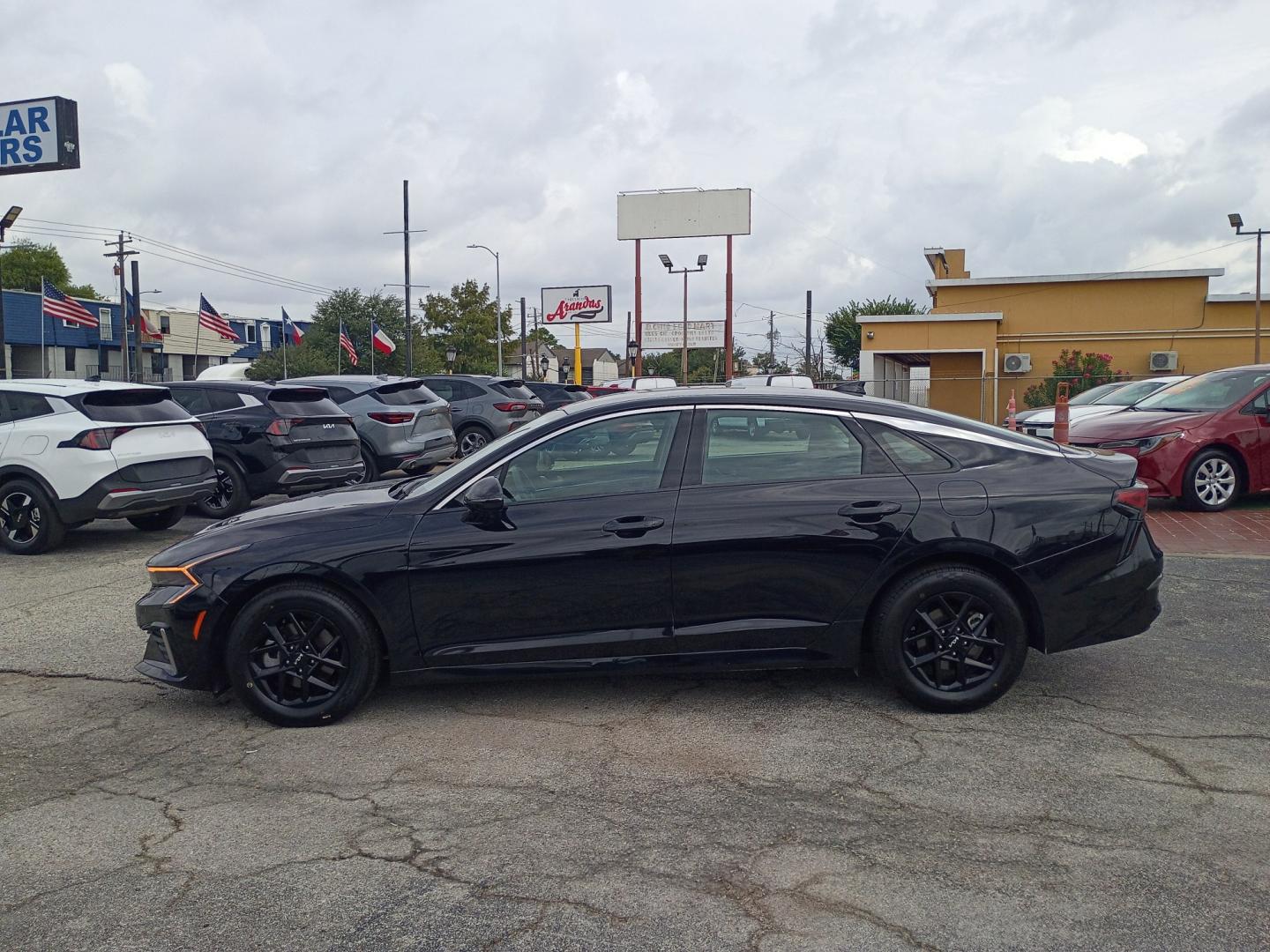 2026 Black /Black KIA K5 LXS (KNAG24J79T5) with an 2.5L L4 DOHC 16V engine, 8A transmission, located at 1842 Wirt Road, Houston, TX, 77055, (713) 973-3903, 29.805330, -95.484787- Photo#1