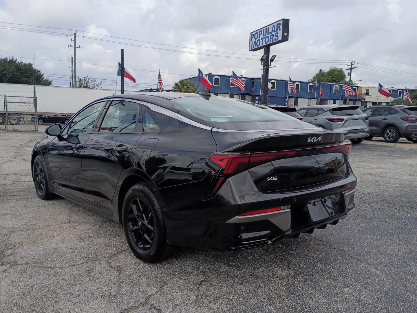2026 Black /Black KIA K5 LXS (KNAG24J79T5) with an 2.5L L4 DOHC 16V engine, 8A transmission, located at 1842 Wirt Road, Houston, TX, 77055, (713) 973-3903, 29.805330, -95.484787- Photo#2
