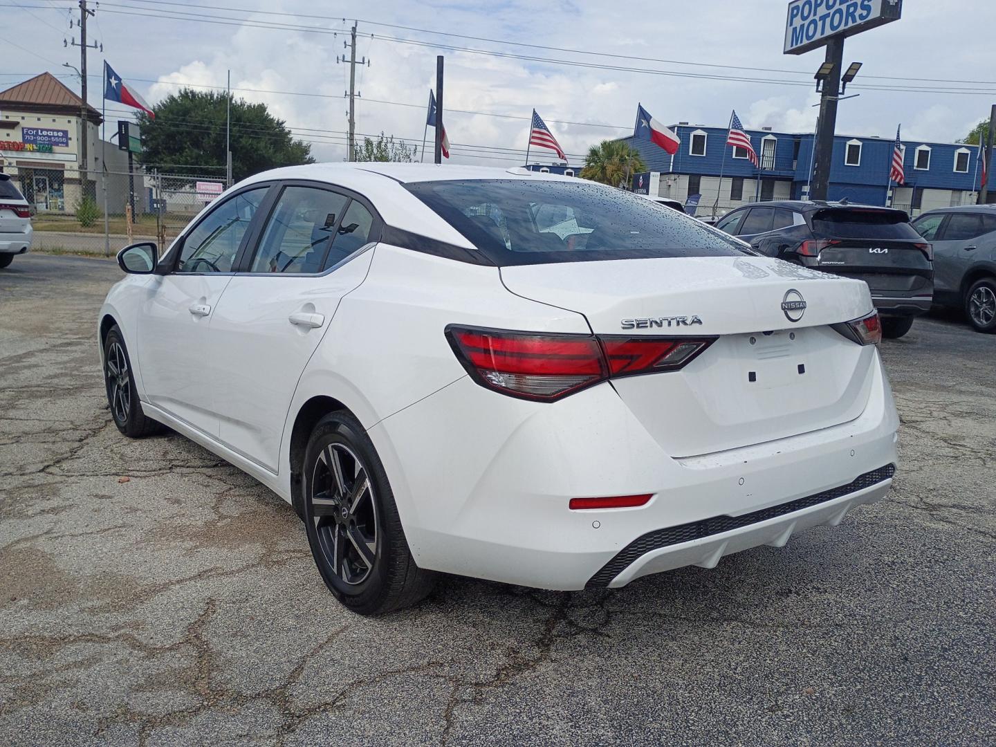 2025 White /Black Nissan Sentra SV (3N1AB8CV1SY) with an 1.8L L4 SFI DOHC 16V engine, CVT transmission, located at 1842 Wirt Road, Houston, TX, 77055, (713) 973-3903, 29.805330, -95.484787- Photo#2