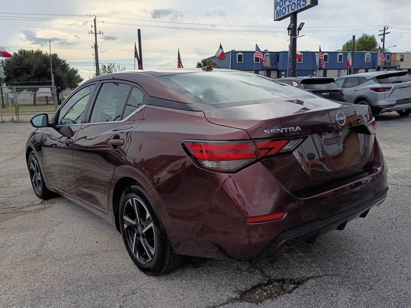 2025 MAROON /Black Nissan Sentra SV (3N1AB8CV4SY) with an 1.8L L4 SFI DOHC 16V engine, CVT transmission, located at 1842 Wirt Road, Houston, TX, 77055, (713) 973-3903, 29.805330, -95.484787- Photo#2