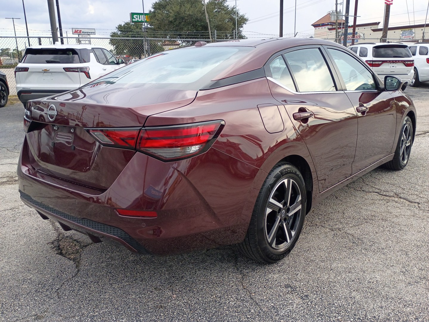 2025 MAROON /Black Nissan Sentra SV (3N1AB8CV4SY) with an 1.8L L4 SFI DOHC 16V engine, CVT transmission, located at 1842 Wirt Road, Houston, TX, 77055, (713) 973-3903, 29.805330, -95.484787- Photo#4
