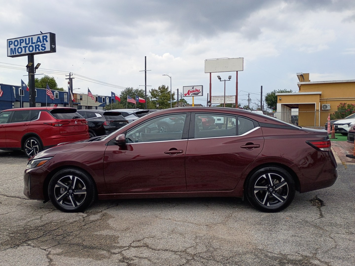 2025 MAROON /Black Nissan Sentra SV (3N1AB8CV4SY) with an 1.8L L4 SFI DOHC 16V engine, CVT transmission, located at 1842 Wirt Road, Houston, TX, 77055, (713) 973-3903, 29.805330, -95.484787- Photo#1
