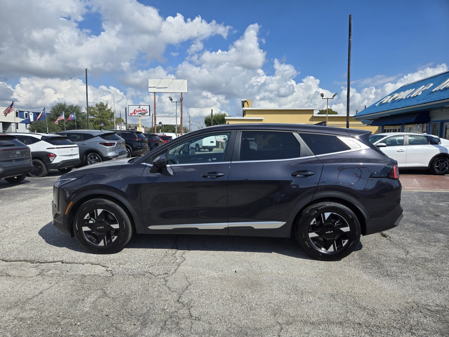 2026 Dark Gray /Black Kia Sportage LX (5XYK23DF8TG) with an 2.5L L4 DOHC 16V engine, 8A transmission, located at 1842 Wirt Road, Houston, TX, 77055, (713) 973-3903, 29.805330, -95.484787- Photo#1