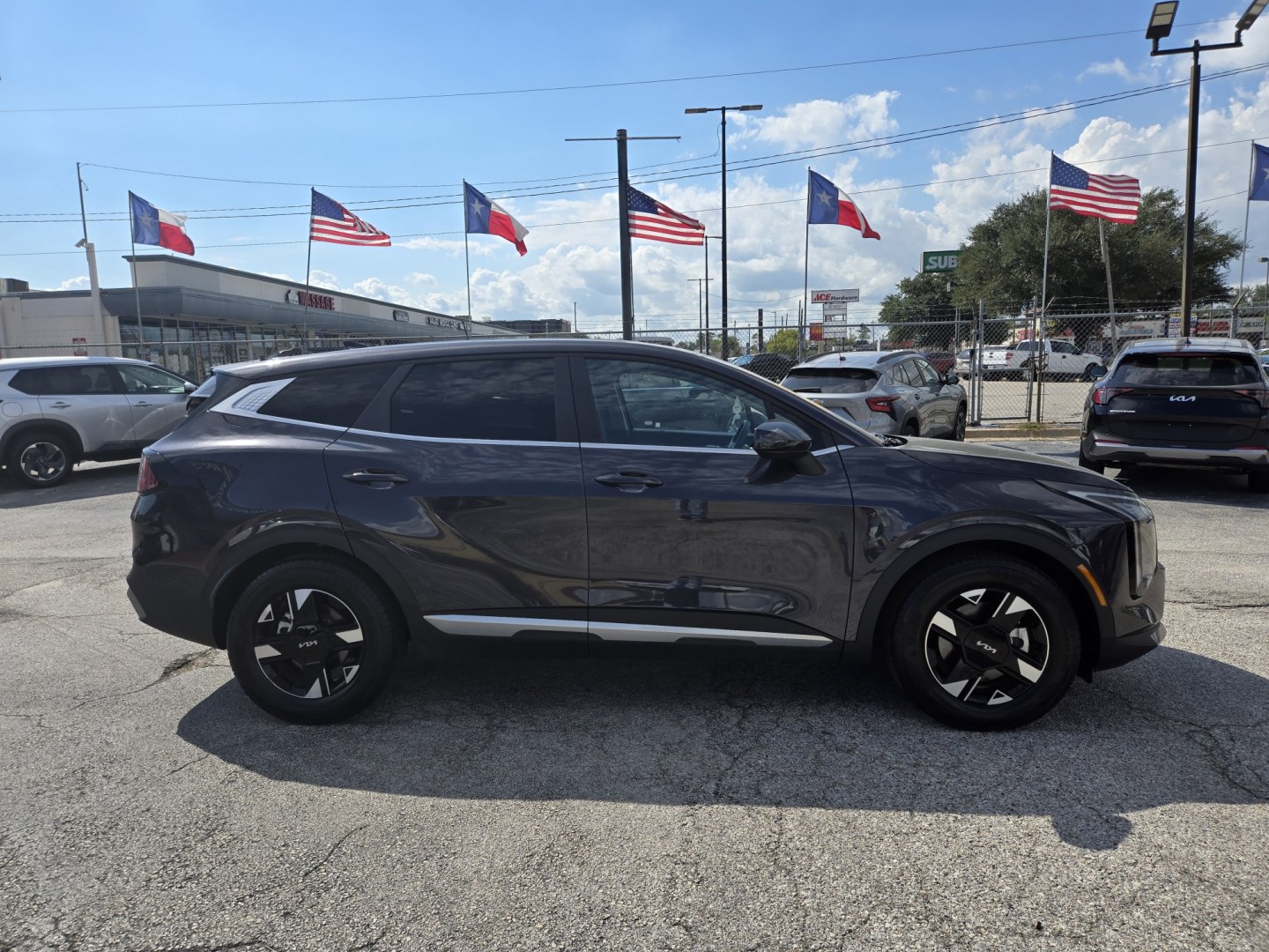 2026 Dark Gray /Black Kia Sportage LX (5XYK23DF8TG) with an 2.5L L4 DOHC 16V engine, 8A transmission, located at 1842 Wirt Road, Houston, TX, 77055, (713) 973-3903, 29.805330, -95.484787- Photo#5