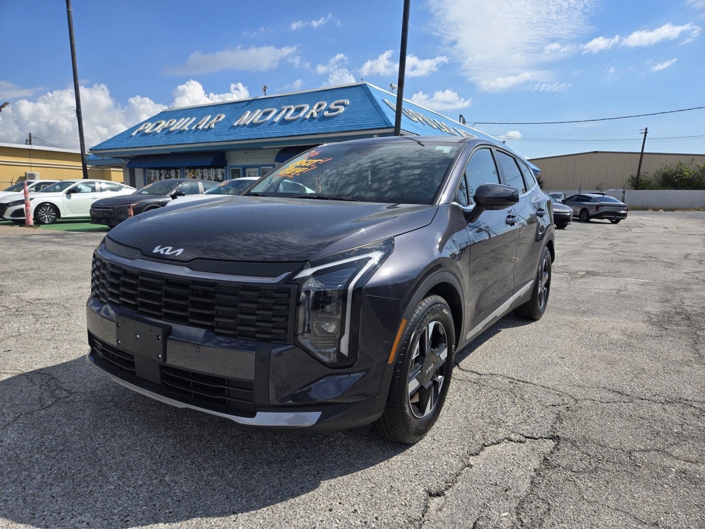 2026 Dark Gray /Black Kia Sportage LX (5XYK23DF8TG) with an 2.5L L4 DOHC 16V engine, 8A transmission, located at 1842 Wirt Road, Houston, TX, 77055, (713) 973-3903, 29.805330, -95.484787- Photo#0