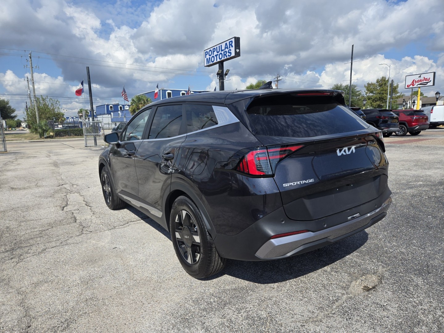 2026 Dark Gray /Black Kia Sportage LX (5XYK23DF8TG) with an 2.5L L4 DOHC 16V engine, 8A transmission, located at 1842 Wirt Road, Houston, TX, 77055, (713) 973-3903, 29.805330, -95.484787- Photo#2