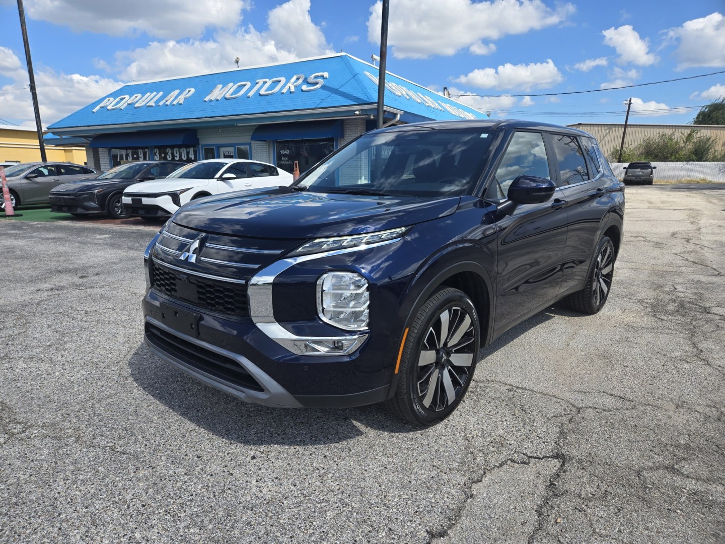 2025 Blue Metallic /Gray Mitsubishi Outlander SE 2WD (JA4J3VA80SZ) with an 2.5L L4 DOHC 16V engine, CVT transmission, located at 1842 Wirt Road, Houston, TX, 77055, (713) 973-3903, 29.805330, -95.484787- Photo#0