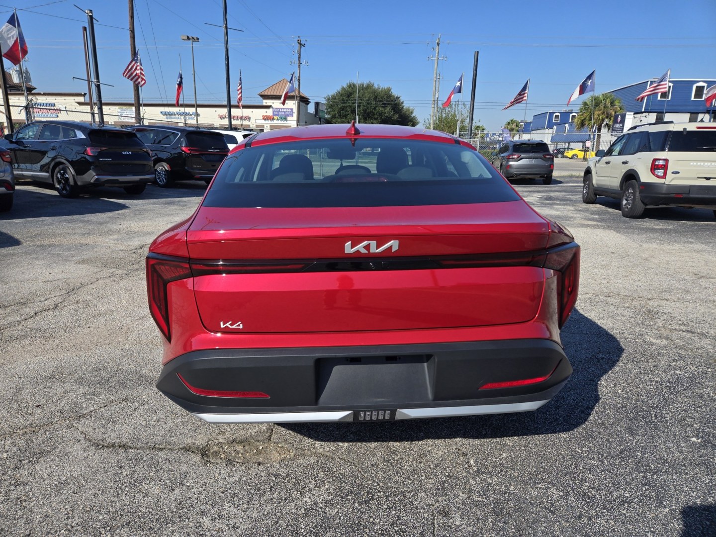 2026 Red /Gray Kia K4 LX, LXS (3KPFT4DE7TE) , located at 1842 Wirt Road, Houston, TX, 77055, (713) 973-3903, 29.805330, -95.484787- Photo#3