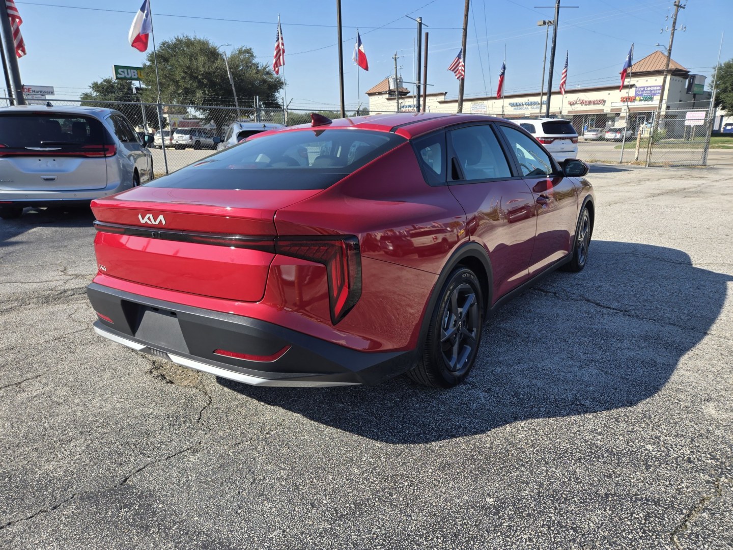 2026 Red /Gray Kia K4 LX, LXS (3KPFT4DE7TE) , located at 1842 Wirt Road, Houston, TX, 77055, (713) 973-3903, 29.805330, -95.484787- Photo#4