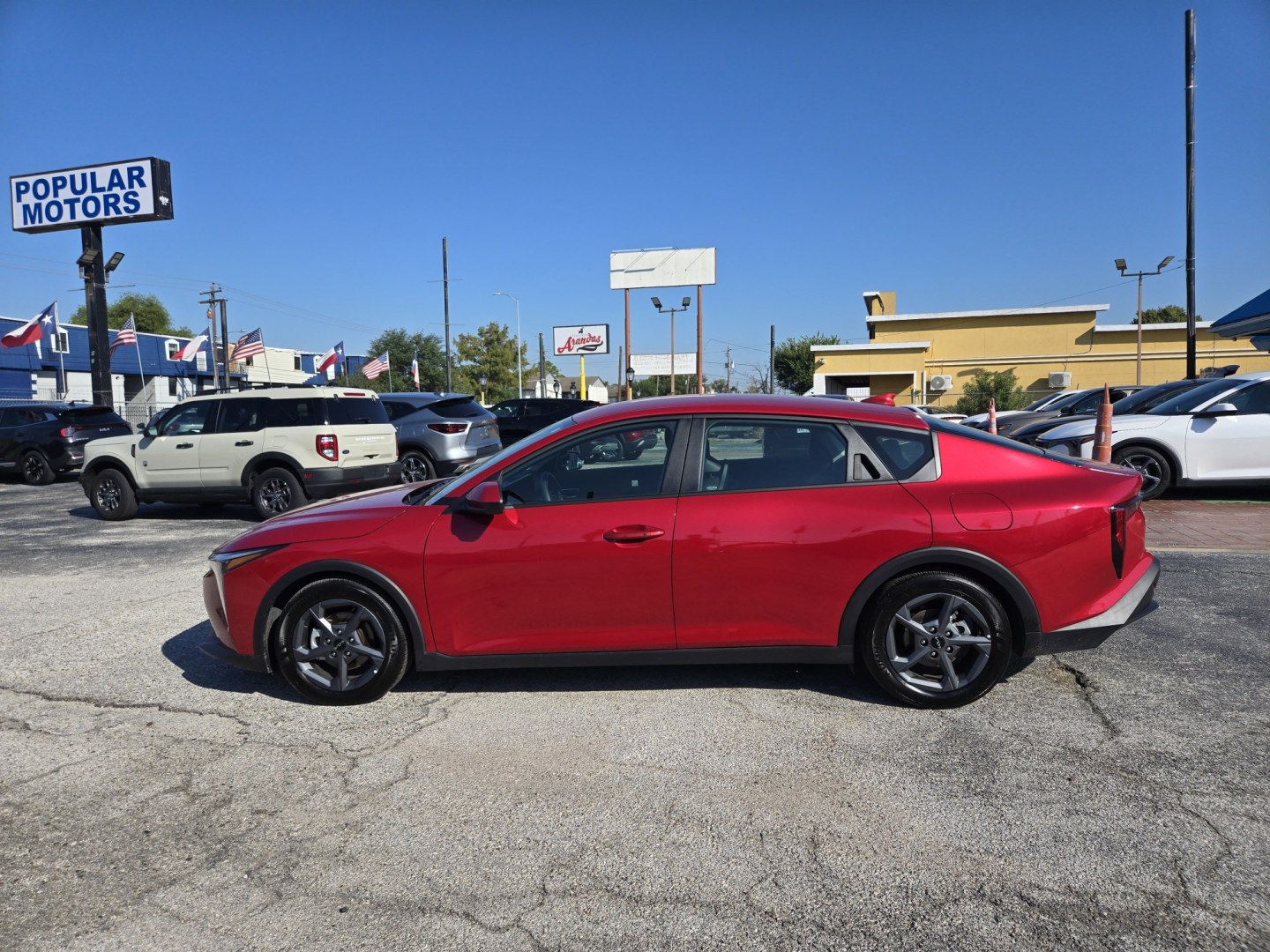 2026 Red /Gray Kia K4 LX, LXS (3KPFT4DE7TE) , located at 1842 Wirt Road, Houston, TX, 77055, (713) 973-3903, 29.805330, -95.484787- Photo#1