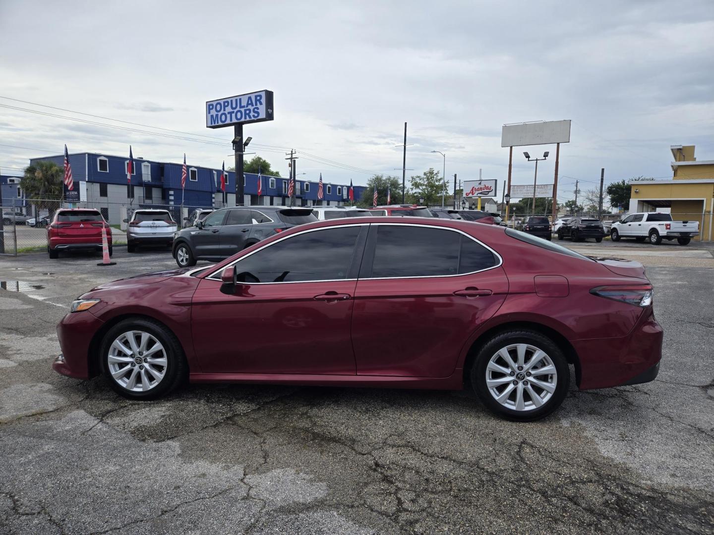 2020 Maroon Toyota Camry LE (4T1C11AK3LU) with an 2.5L L4 DOHC 16V engine, 8A transmission, located at 1842 Wirt Road, Houston, TX, 77055, (713) 973-3903, 29.805330, -95.484787 - Photo#1