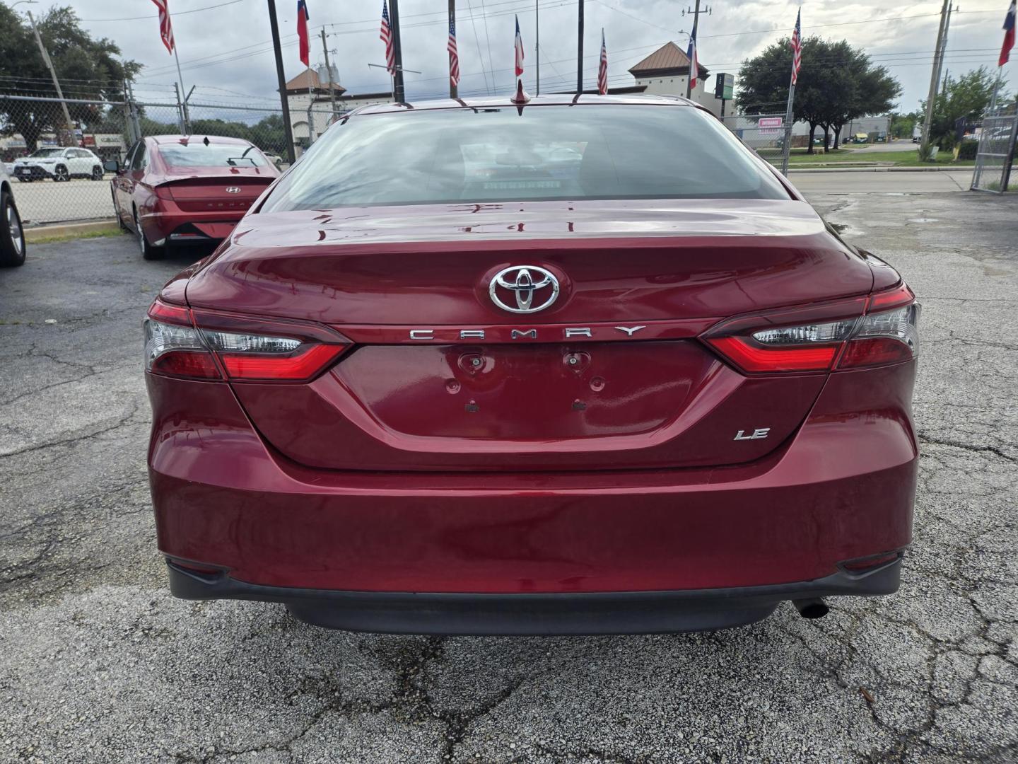 2020 Maroon Toyota Camry LE (4T1C11AK3LU) with an 2.5L L4 DOHC 16V engine, 8A transmission, located at 1842 Wirt Road, Houston, TX, 77055, (713) 973-3903, 29.805330, -95.484787 - Photo#3