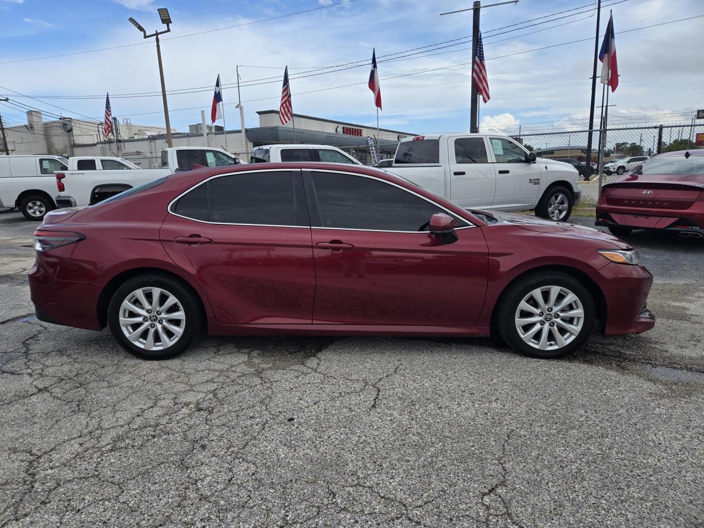 2020 Maroon Toyota Camry LE (4T1C11AK3LU) with an 2.5L L4 DOHC 16V engine, 8A transmission, located at 1842 Wirt Road, Houston, TX, 77055, (713) 973-3903, 29.805330, -95.484787 - Photo#5