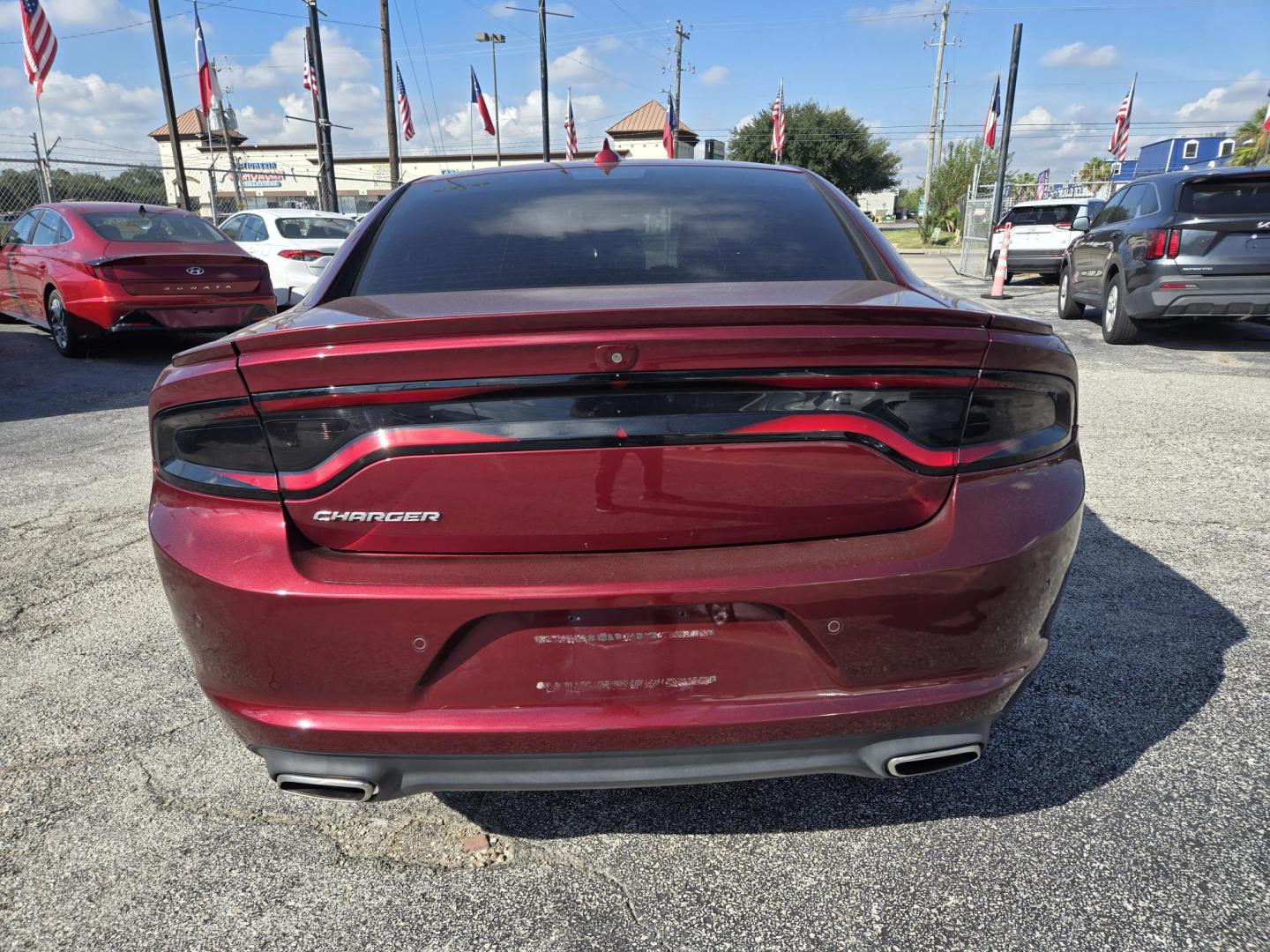 2019 Maroon /Black Dodge Charger SXT (2C3CDXBG3KH) with an 3.6L V6 DOHC 24V engine, 8A transmission, located at 1842 Wirt Road, Houston, TX, 77055, (713) 973-3903, 29.805330, -95.484787 - Photo#4