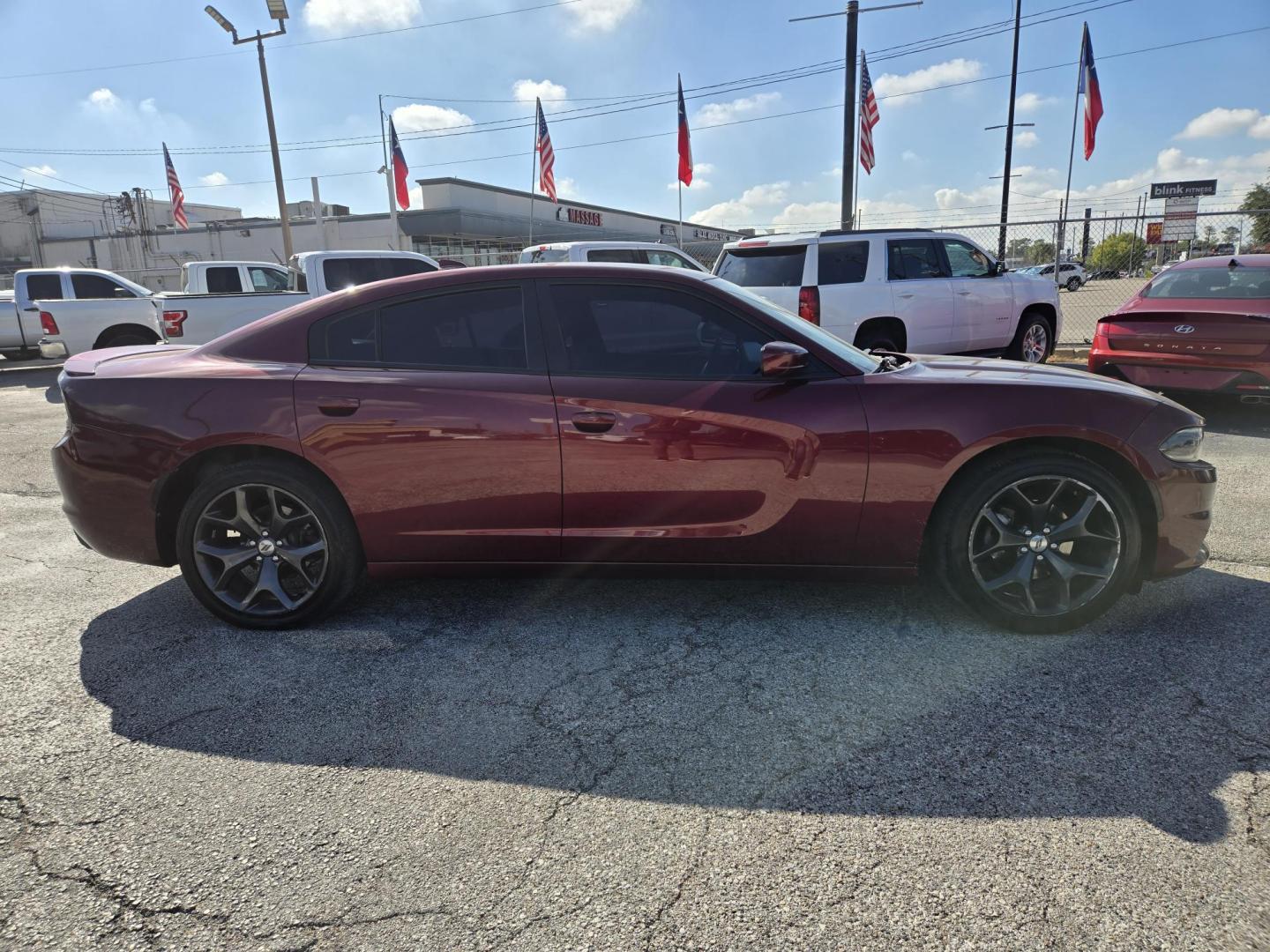 2019 Maroon /Black Dodge Charger SXT (2C3CDXBG3KH) with an 3.6L V6 DOHC 24V engine, 8A transmission, located at 1842 Wirt Road, Houston, TX, 77055, (713) 973-3903, 29.805330, -95.484787 - Photo#6
