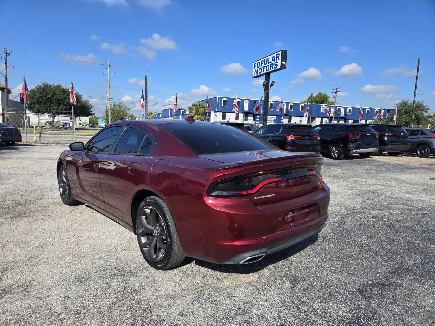 2019 Maroon /Black Dodge Charger SXT (2C3CDXBG3KH) with an 3.6L V6 DOHC 24V engine, 8A transmission, located at 1842 Wirt Road, Houston, TX, 77055, (713) 973-3903, 29.805330, -95.484787 - Photo#2