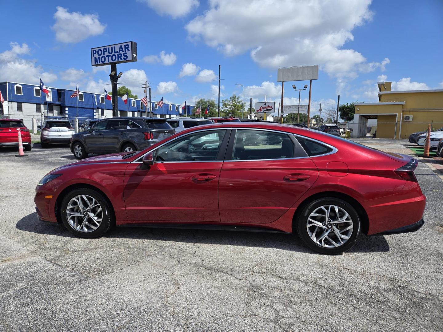 2023 Red Hyundai Sonata (KMHL64JA5PA) , located at 1842 Wirt Road, Houston, TX, 77055, (713) 973-3903, 29.805330, -95.484787 - Photo#1