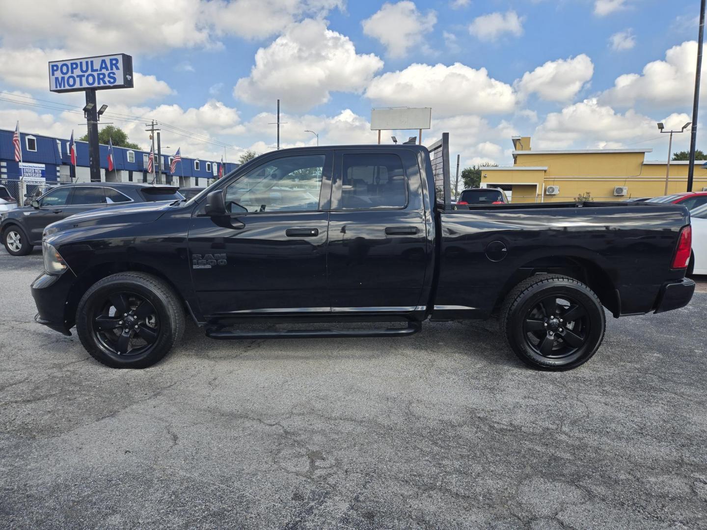 2019 Black /Black RAM 1500 Tradesman Quad Cab 4WD (1C6RR7FG5KS) with an 3.6L V6 DOHC 24V FFV engine, 8A transmission, located at 1842 Wirt Road, Houston, TX, 77055, (713) 973-3903, 29.805330, -95.484787 - Photo#1