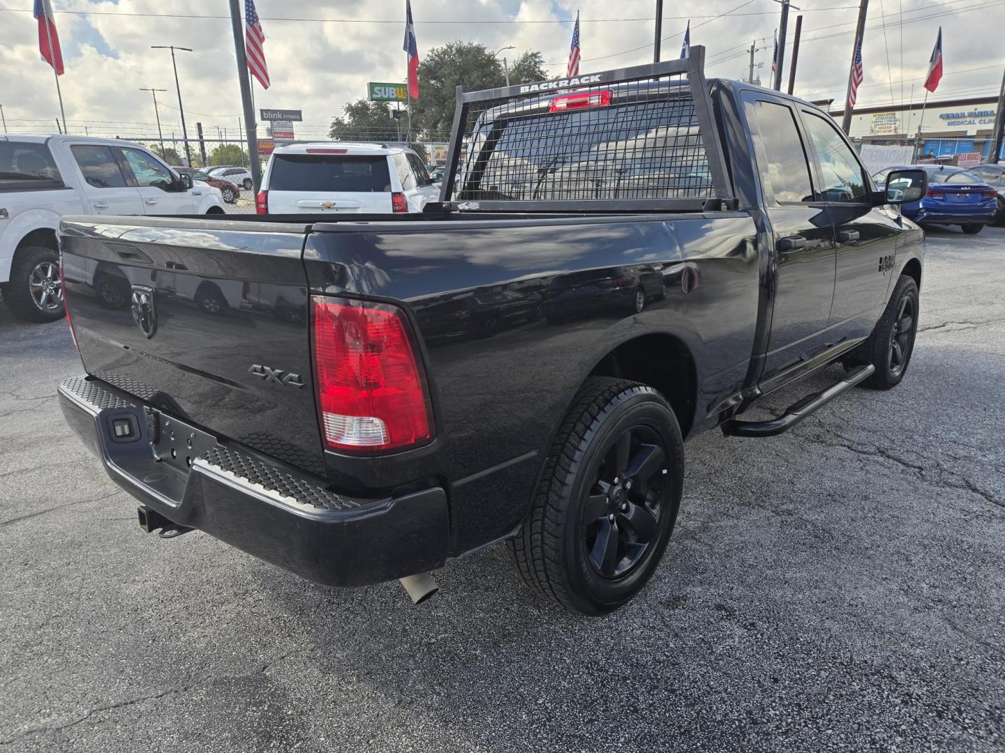 2019 Black /Black RAM 1500 Tradesman Quad Cab 4WD (1C6RR7FG5KS) with an 3.6L V6 DOHC 24V FFV engine, 8A transmission, located at 1842 Wirt Road, Houston, TX, 77055, (713) 973-3903, 29.805330, -95.484787 - Photo#4