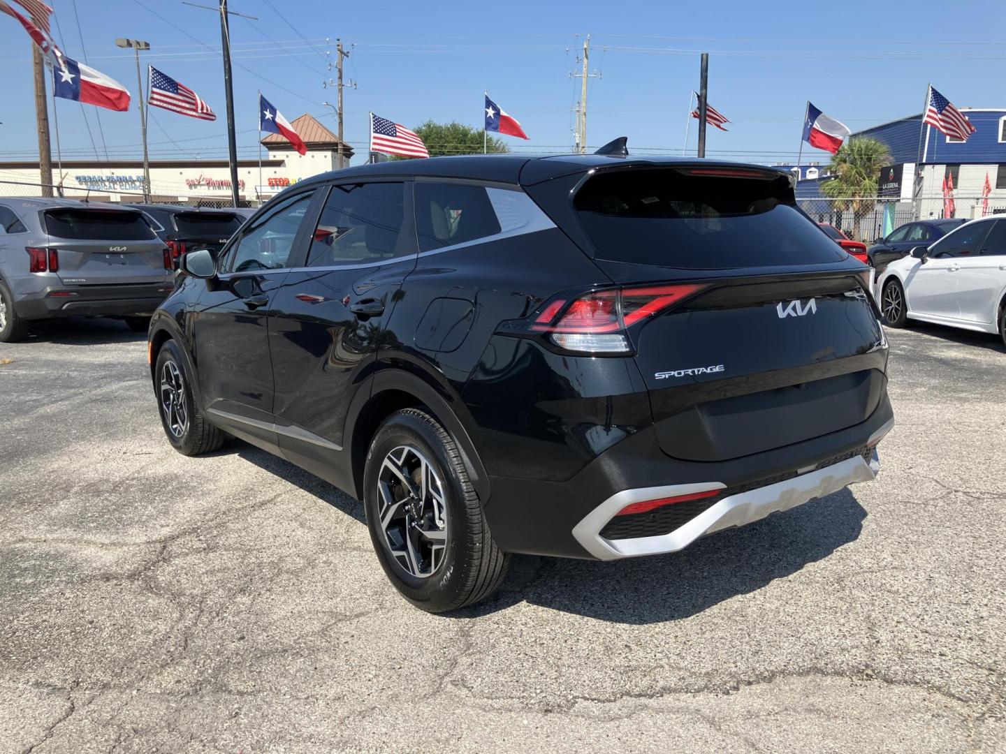 2023 Black /Black Kia Sportage LX FWD (KNDPU3AF7P7) with an 2.5L V6 DOHC 24V engine, 8A transmission, located at 1842 Wirt Road, Houston, TX, 77055, (713) 973-3903, 29.805330, -95.484787 - Photo#2