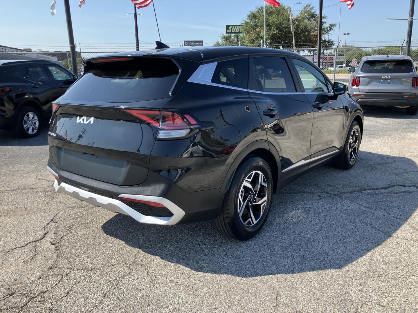 2023 Black /Black Kia Sportage LX FWD (KNDPU3AF7P7) with an 2.5L V6 DOHC 24V engine, 8A transmission, located at 1842 Wirt Road, Houston, TX, 77055, (713) 973-3903, 29.805330, -95.484787 - Photo#3