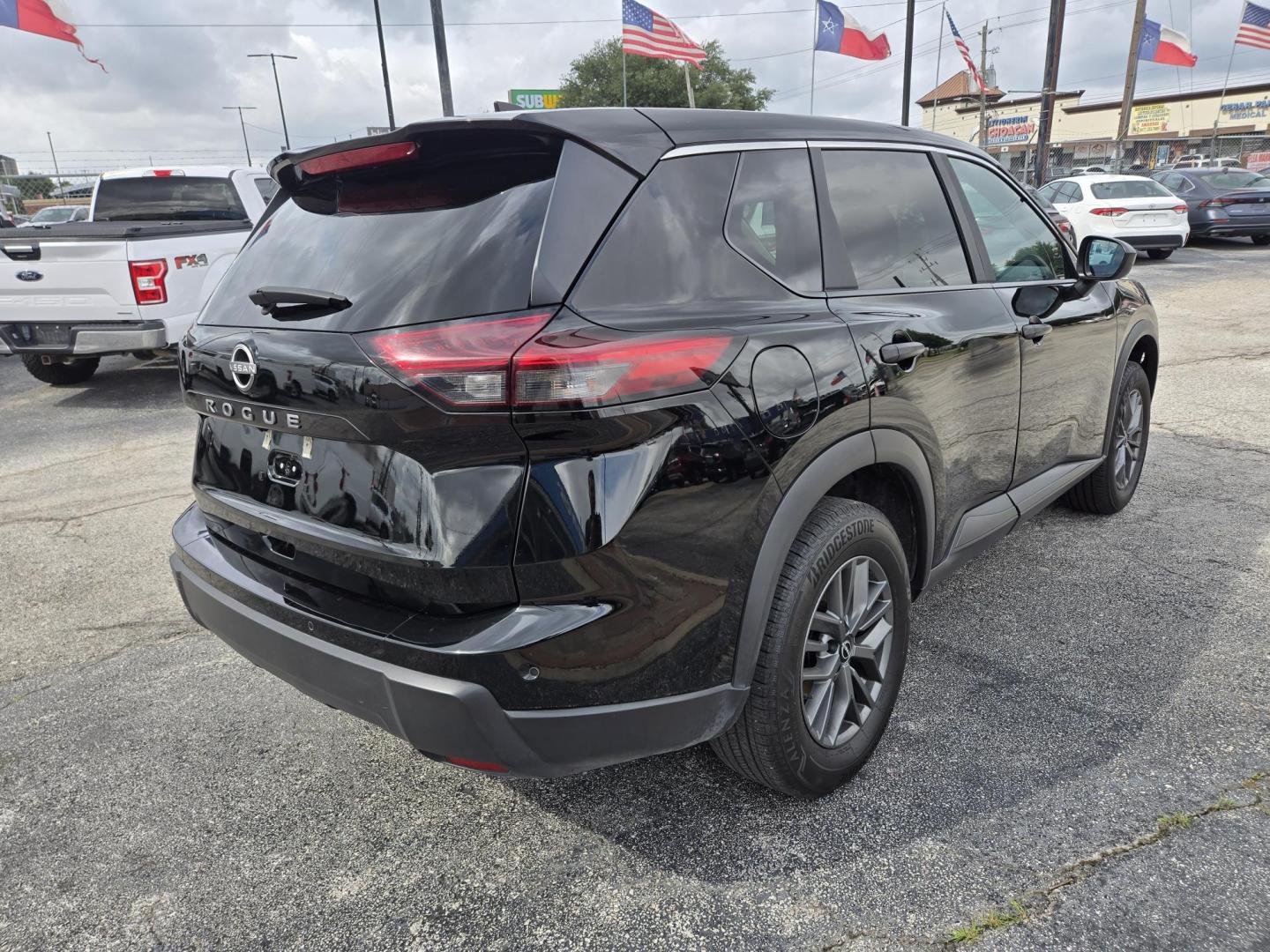 2024 Black Nissan Rogue S (5N1BT3AA2RC) with an 2.5L L4 DOHC 16V engine, CVT transmission, located at 1842 Wirt Road, Houston, TX, 77055, (713) 973-3903, 29.805330, -95.484787 - Photo#4