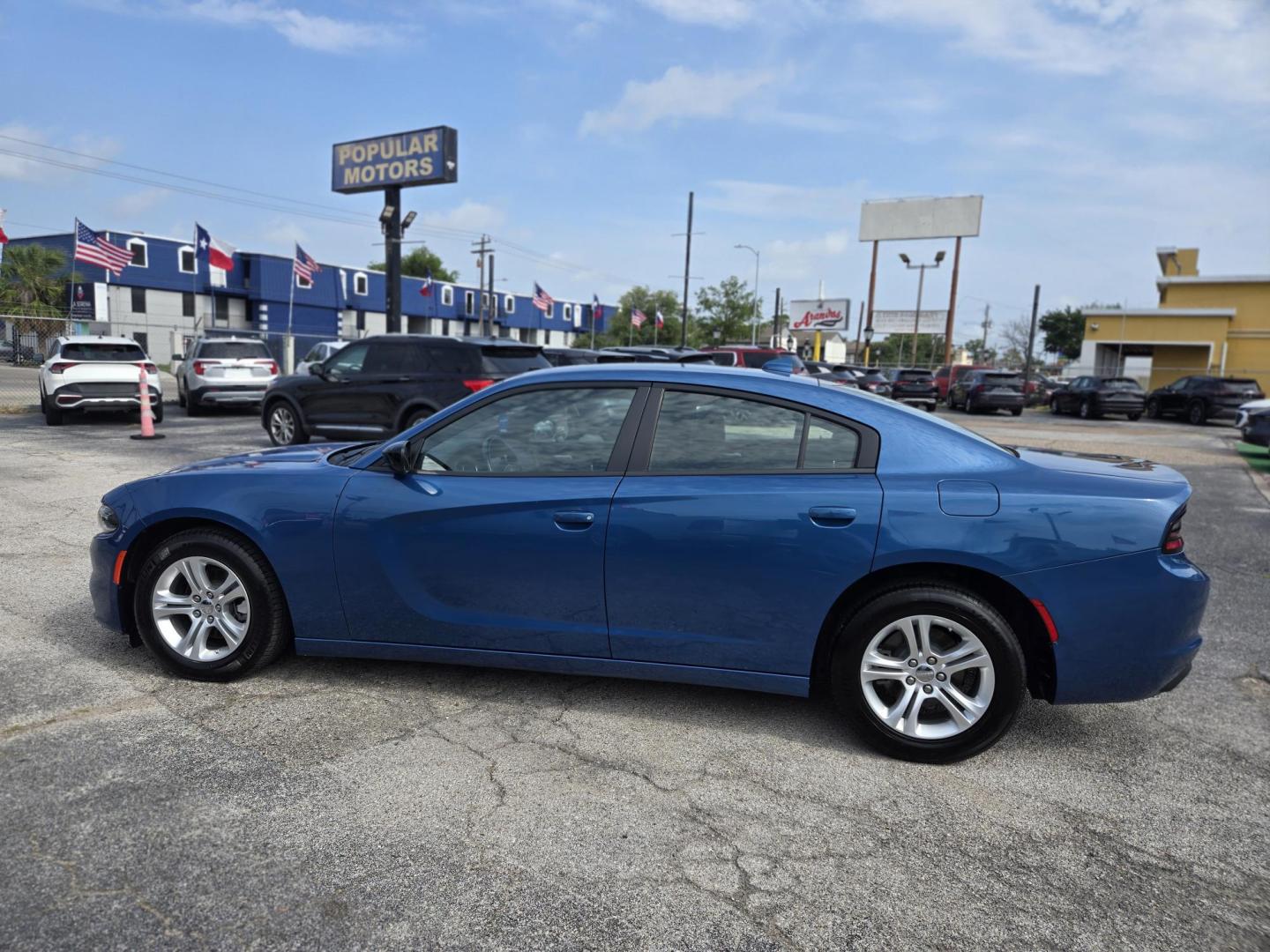 2023 BLUE Dodge Charger SXT (2C3CDXBG0PH) with an 3.6L V6 DOHC 24V engine, 8A transmission, located at 1842 Wirt Road, Houston, TX, 77055, (713) 973-3903, 29.805330, -95.484787 - Photo#1