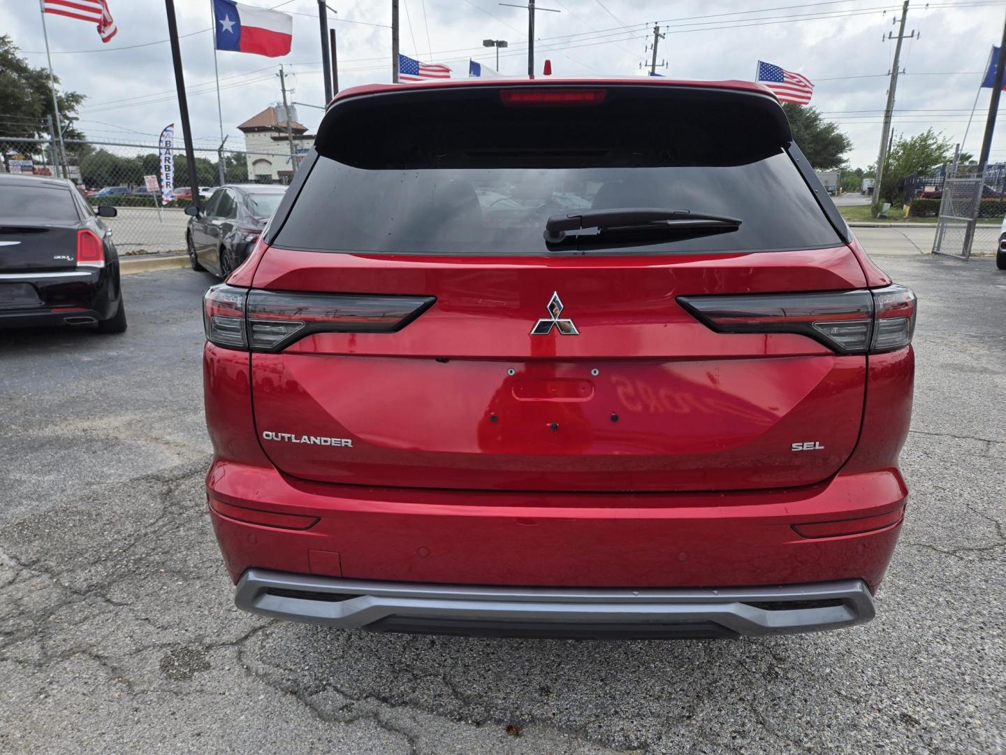 2025 MAROON /BEIGE Mitsubishi Outlander SEL (JA4J3WA82SZ) with an 2.4L L4 DOHC 16V engine, CVT transmission, located at 1842 Wirt Road, Houston, TX, 77055, (713) 973-3903, 29.805330, -95.484787 - Photo#3