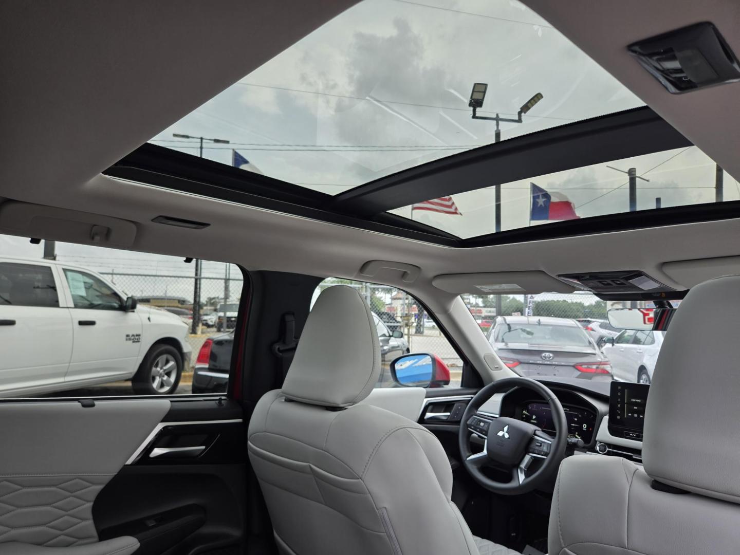 2025 MAROON /BEIGE Mitsubishi Outlander SEL (JA4J3WA82SZ) with an 2.4L L4 DOHC 16V engine, CVT transmission, located at 1842 Wirt Road, Houston, TX, 77055, (713) 973-3903, 29.805330, -95.484787 - Photo#17