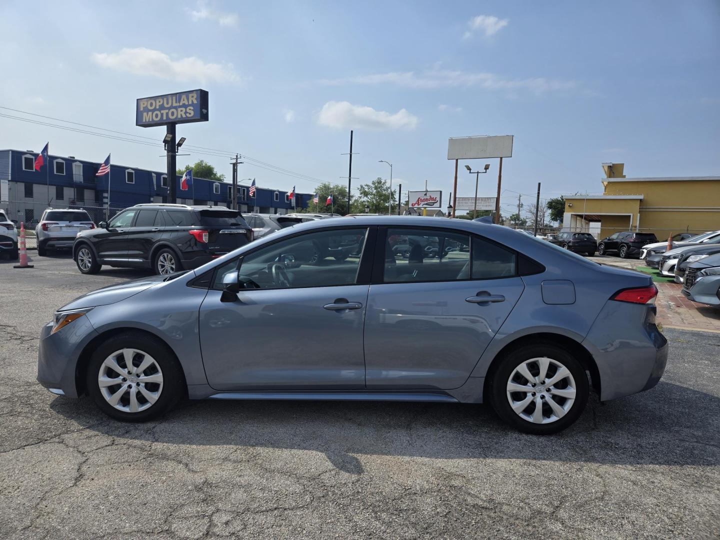 2023 Celestite /Black Toyota Corolla LE (5YFB4MDE4PP) with an 2.0L L4 DOHC 16V engine, CVT transmission, located at 1842 Wirt Road, Houston, TX, 77055, (713) 973-3903, 29.805330, -95.484787 - Photo#1