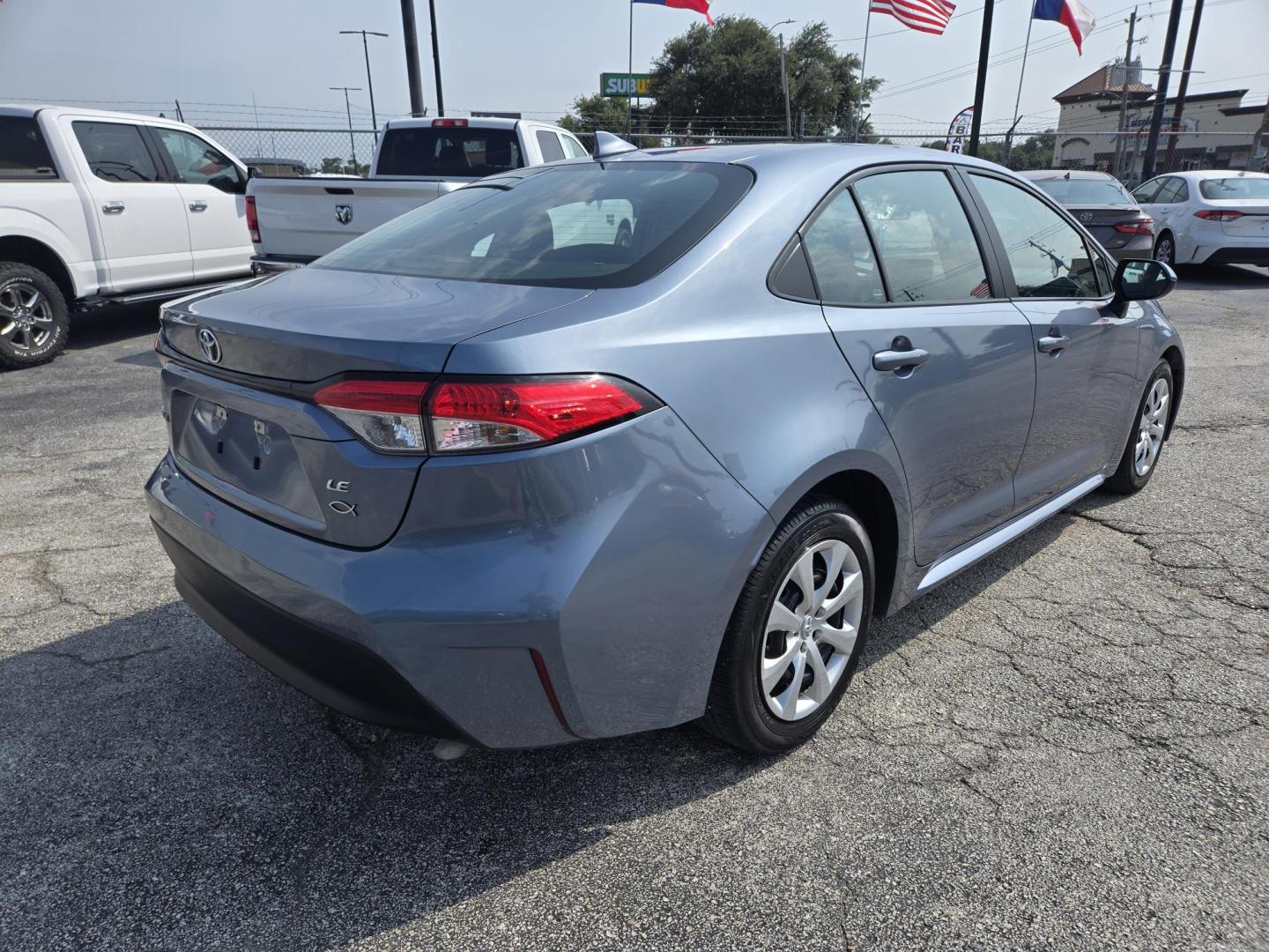2023 Celestite /Black Toyota Corolla LE (5YFB4MDE4PP) with an 2.0L L4 DOHC 16V engine, CVT transmission, located at 1842 Wirt Road, Houston, TX, 77055, (713) 973-3903, 29.805330, -95.484787 - Photo#4