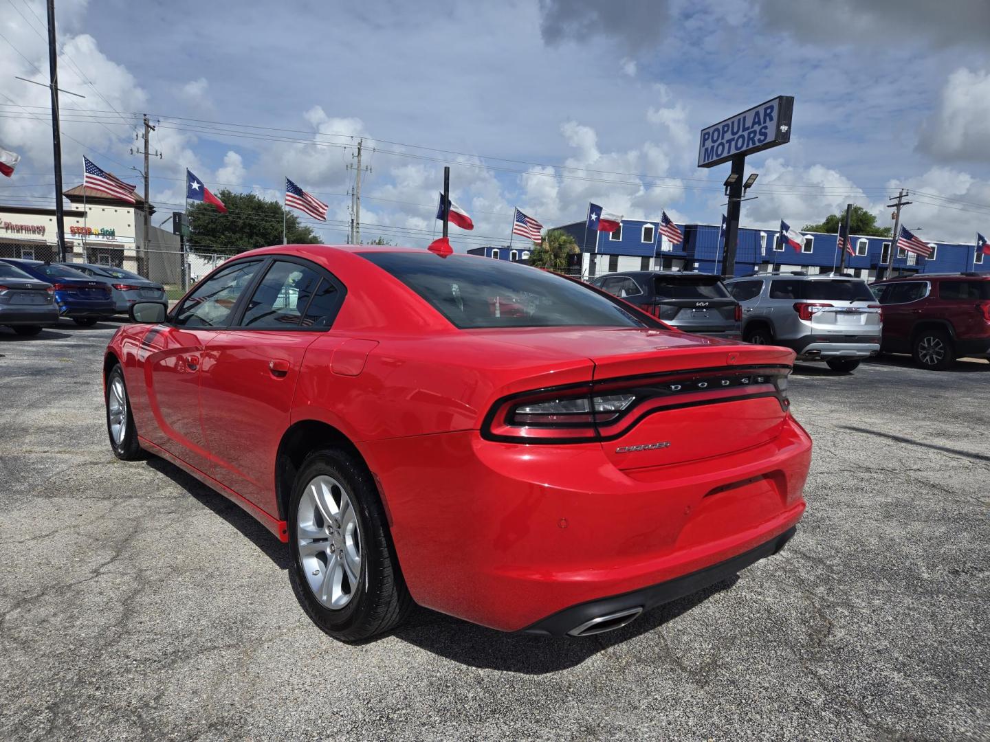 2023 Red /Black Dodge Charger SXT (2C3CDXBG1PH) with an 3.6L V6 DOHC 24V engine, 8A transmission, located at 1842 Wirt Road, Houston, TX, 77055, (713) 973-3903, 29.805330, -95.484787 - Photo#2