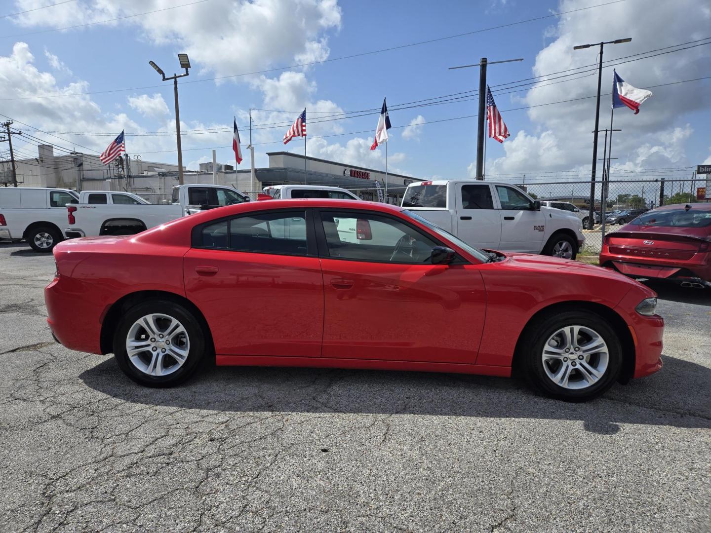 2023 Red /Black Dodge Charger SXT (2C3CDXBG1PH) with an 3.6L V6 DOHC 24V engine, 8A transmission, located at 1842 Wirt Road, Houston, TX, 77055, (713) 973-3903, 29.805330, -95.484787 - Photo#5