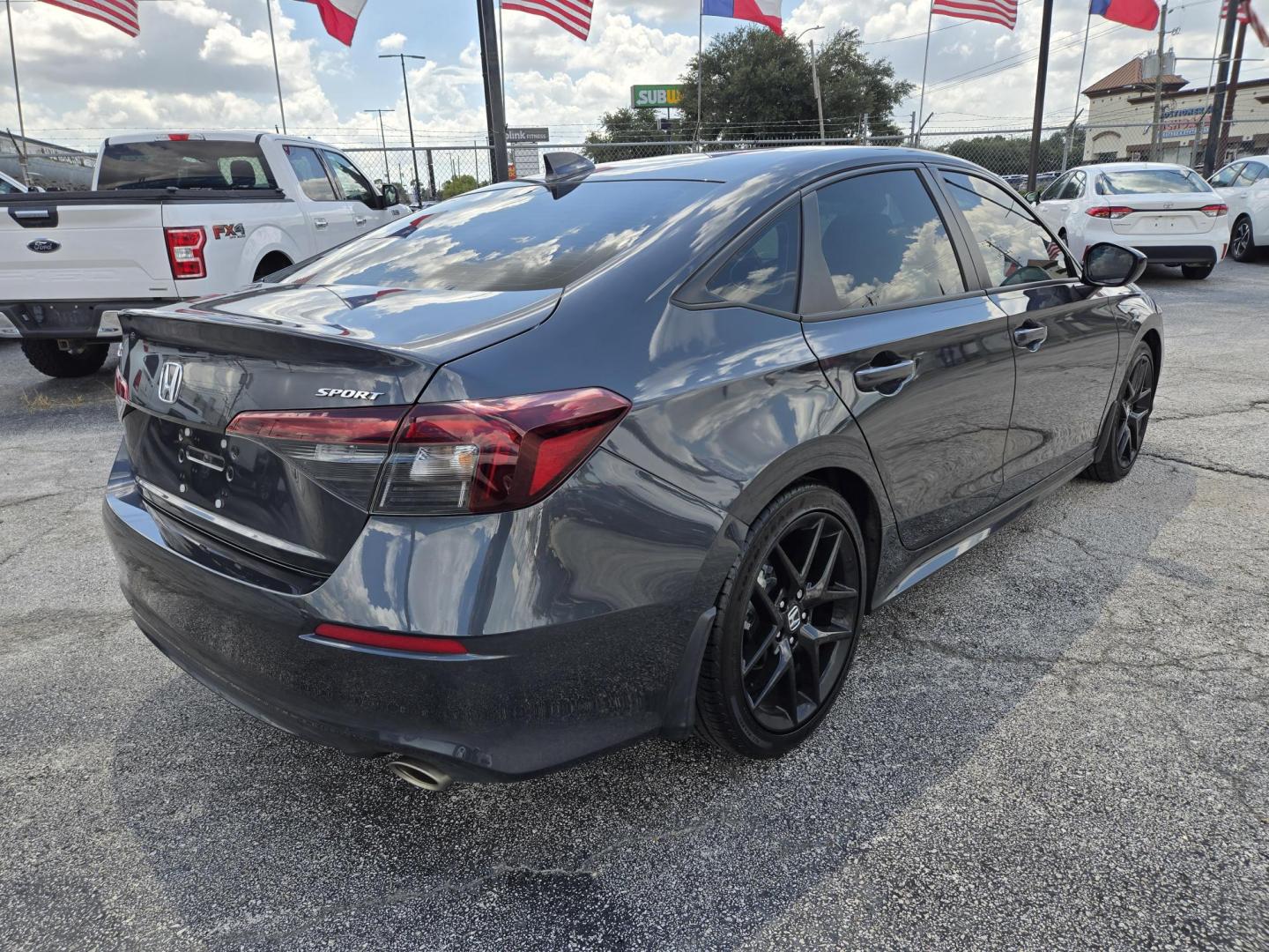 2025 Gray /Black Honda Civic Sport (2HGFE2F55SH) with an 2.0L L4 DOHC 16V engine, CVT transmission, located at 1842 Wirt Road, Houston, TX, 77055, (713) 973-3903, 29.805330, -95.484787 - Photo#4