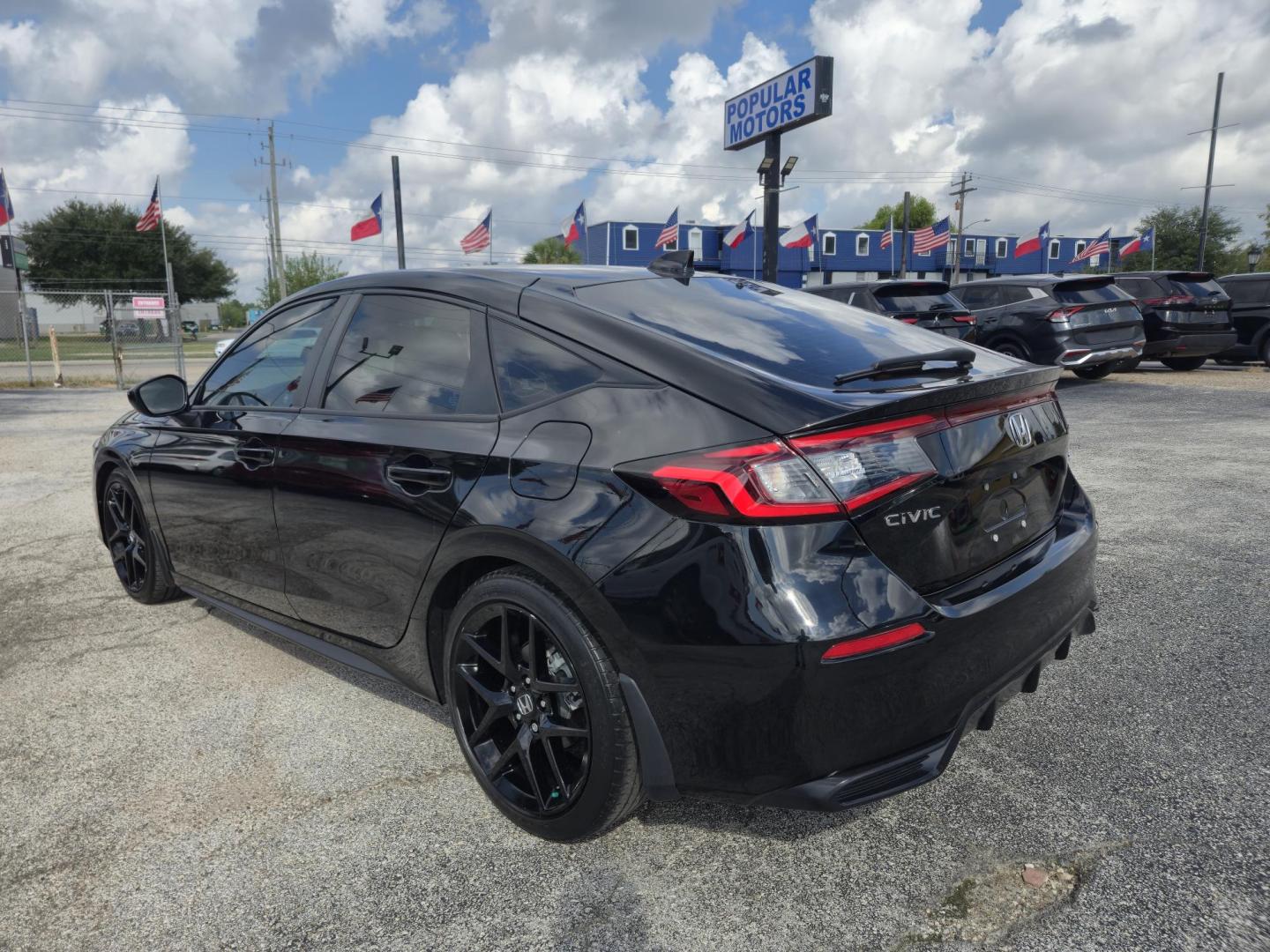 2024 Black /Black Honda Civic Sport Hatchback CVT (19XFL2H81RE) with an 2.0L L4 DOHC 16V TURBO engine, CVT transmission, located at 1842 Wirt Road, Houston, TX, 77055, (713) 973-3903, 29.805330, -95.484787 - Photo#2