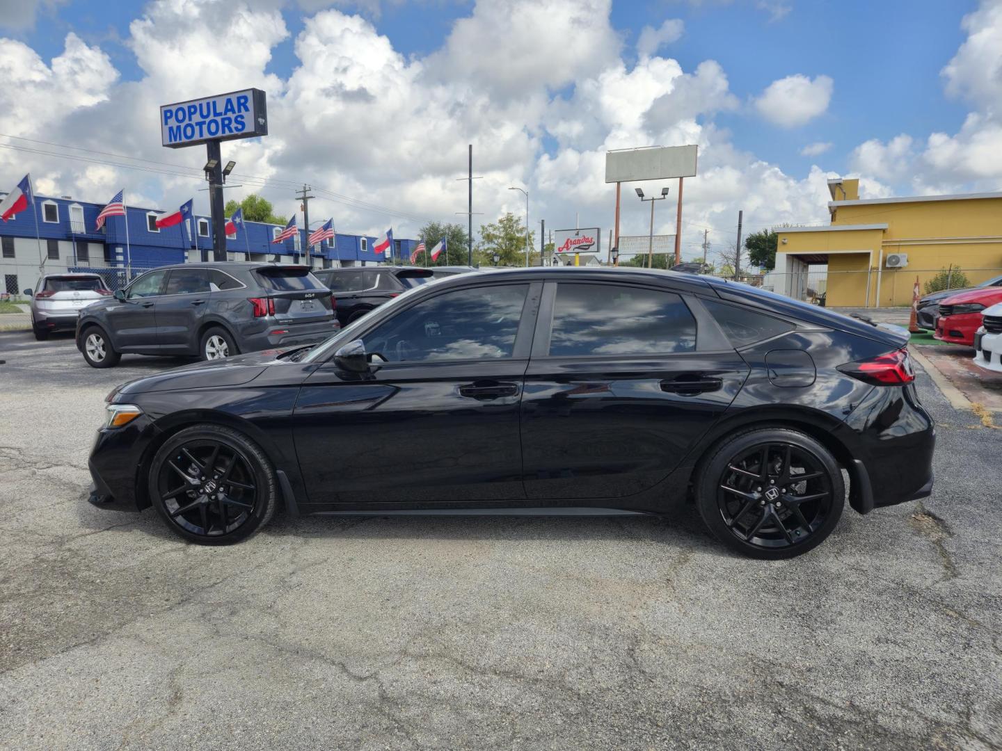 2024 Black /Black Honda Civic Sport Hatchback CVT (19XFL2H81RE) with an 2.0L L4 DOHC 16V TURBO engine, CVT transmission, located at 1842 Wirt Road, Houston, TX, 77055, (713) 973-3903, 29.805330, -95.484787 - Photo#1