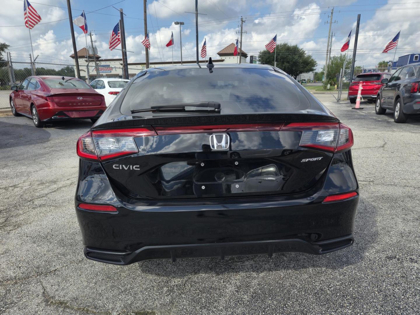 2024 Black /Black Honda Civic Sport Hatchback CVT (19XFL2H81RE) with an 2.0L L4 DOHC 16V TURBO engine, CVT transmission, located at 1842 Wirt Road, Houston, TX, 77055, (713) 973-3903, 29.805330, -95.484787 - Photo#3