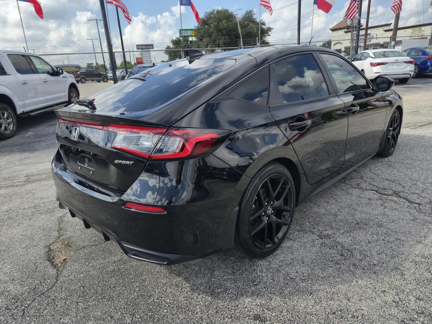 2024 Black /Black Honda Civic Sport Hatchback CVT (19XFL2H81RE) with an 2.0L L4 DOHC 16V TURBO engine, CVT transmission, located at 1842 Wirt Road, Houston, TX, 77055, (713) 973-3903, 29.805330, -95.484787 - Photo#4