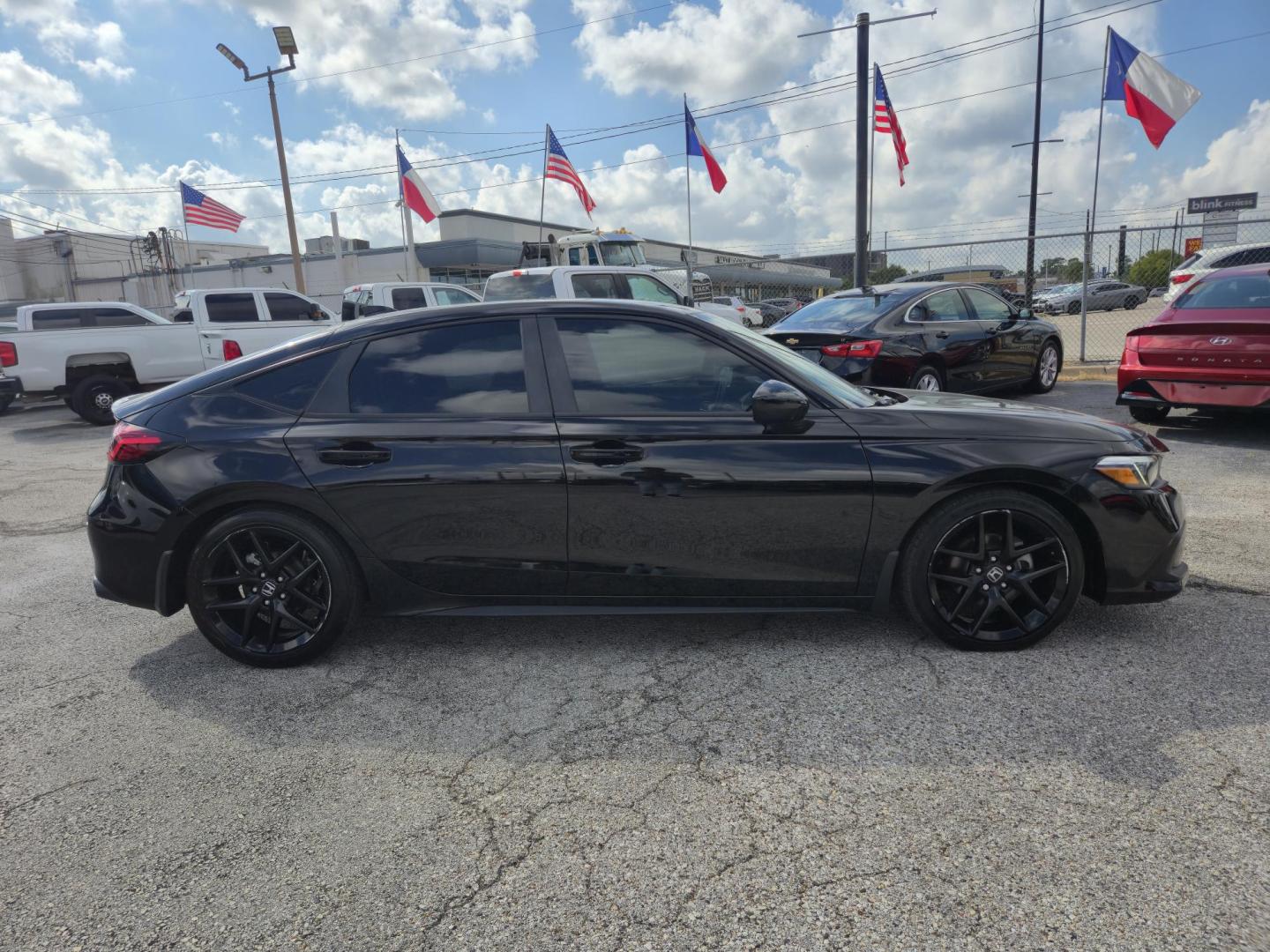 2024 Black /Black Honda Civic Sport Hatchback CVT (19XFL2H81RE) with an 2.0L L4 DOHC 16V TURBO engine, CVT transmission, located at 1842 Wirt Road, Houston, TX, 77055, (713) 973-3903, 29.805330, -95.484787 - Photo#5