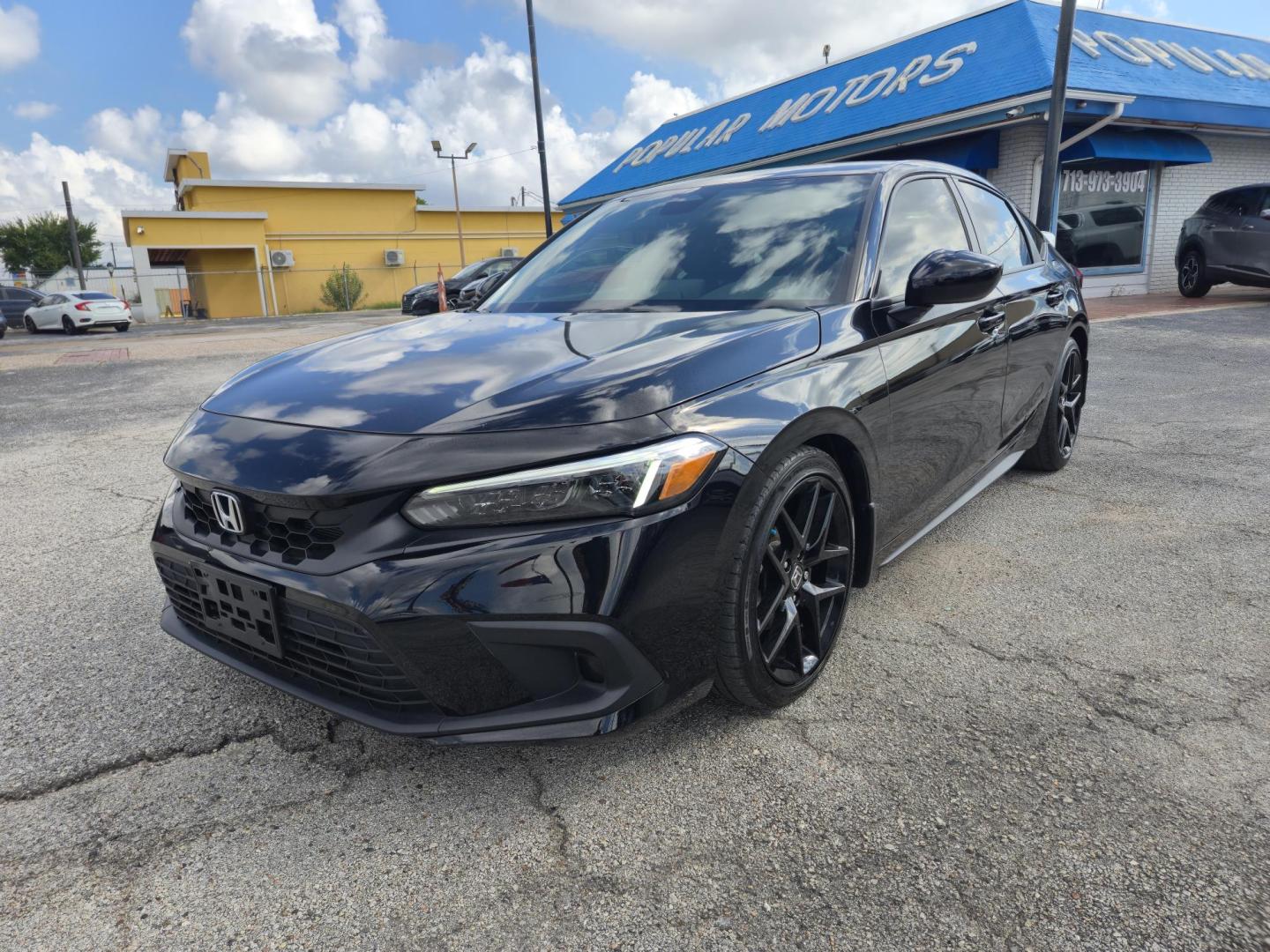 2024 Black /Black Honda Civic Sport Hatchback CVT (19XFL2H81RE) with an 2.0L L4 DOHC 16V TURBO engine, CVT transmission, located at 1842 Wirt Road, Houston, TX, 77055, (713) 973-3903, 29.805330, -95.484787 - Photo#0