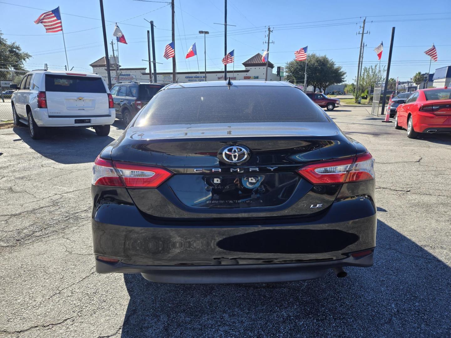 2020 Black /Black Toyota Camry LE (4T1C11AK2LU) with an 2.5L L4 DOHC 16V engine, 8A transmission, located at 1842 Wirt Road, Houston, TX, 77055, (713) 973-3903, 29.805330, -95.484787 - Photo#3