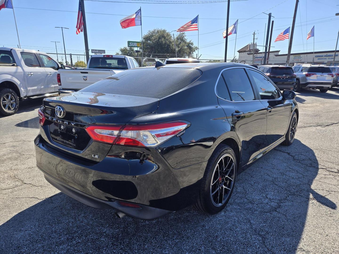2020 Black /Black Toyota Camry LE (4T1C11AK2LU) with an 2.5L L4 DOHC 16V engine, 8A transmission, located at 1842 Wirt Road, Houston, TX, 77055, (713) 973-3903, 29.805330, -95.484787 - Photo#4