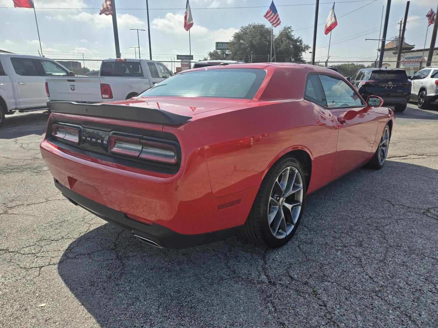 2023 Red /Black Dodge Challenger GT (2C3CDZJG3PH) with an 3.6L V6 DOHC 24V engine, 8A transmission, located at 1842 Wirt Road, Houston, TX, 77055, (713) 973-3903, 29.805330, -95.484787 - Photo#4