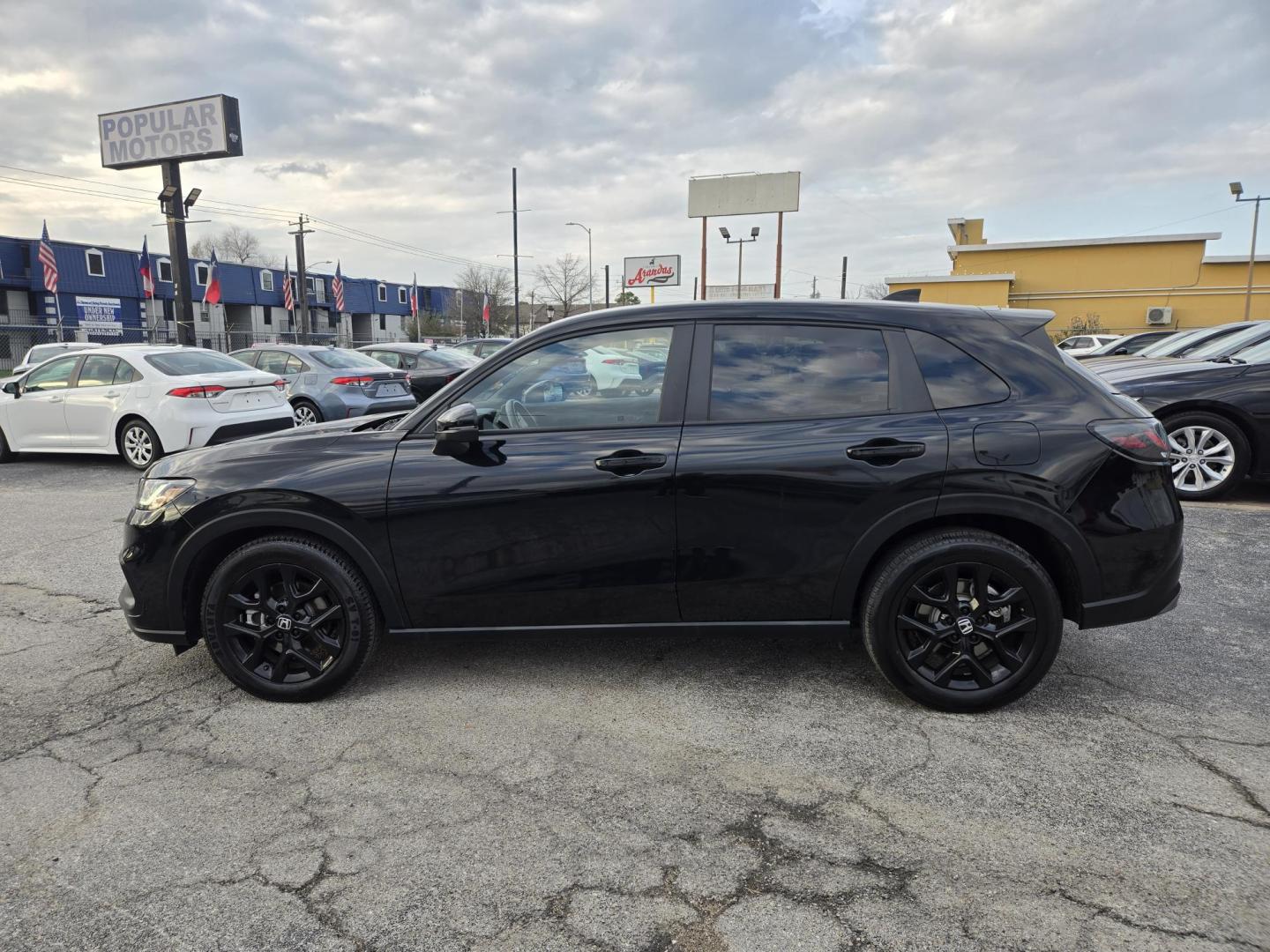 2025 Black /Black Honda HR-V Sport AWD (3CZRZ2H54SM) with an 1.8L L4 DOHC 16V engine, CVT transmission, located at 1842 Wirt Road, Houston, TX, 77055, (713) 973-3903, 29.805330, -95.484787 - Photo#1