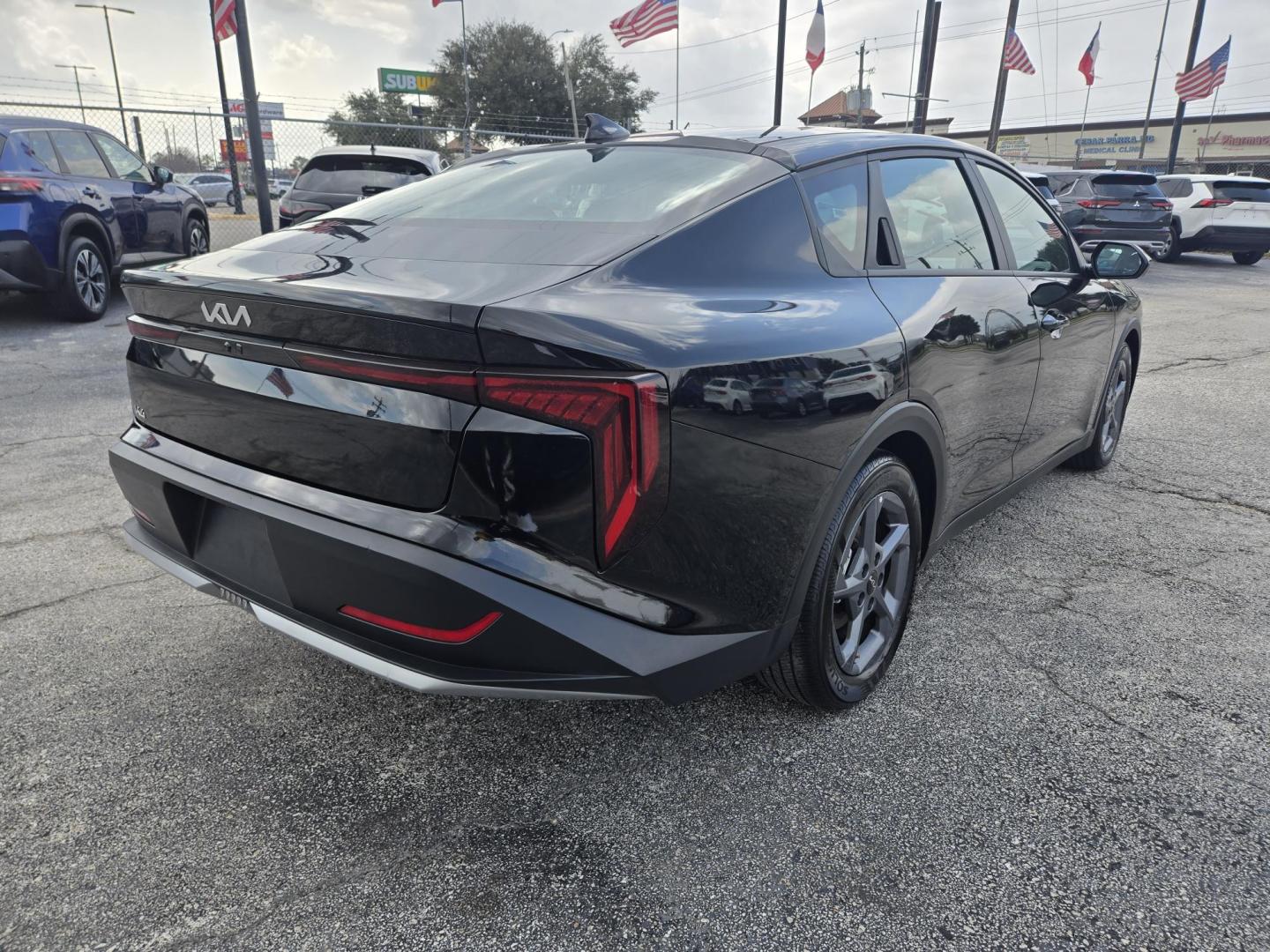 2025 Black /Gray Kia K4 LX (3KPFT4DE0SE) with an 2.0L L4 DOHC 16V engine, CVT transmission, located at 1842 Wirt Road, Houston, TX, 77055, (713) 973-3903, 29.805330, -95.484787 - Photo#4